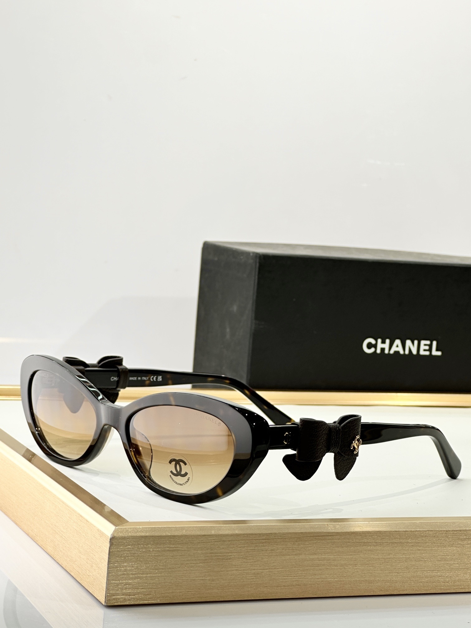 Chanel Women's Oval Bow Sunglasses - Premium Luxury Eyewear