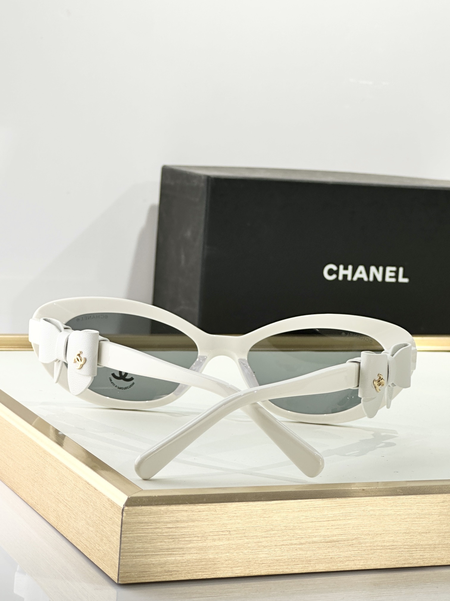 Chanel White Oval Sunglasses with Bow Detail & Gold CC Logo