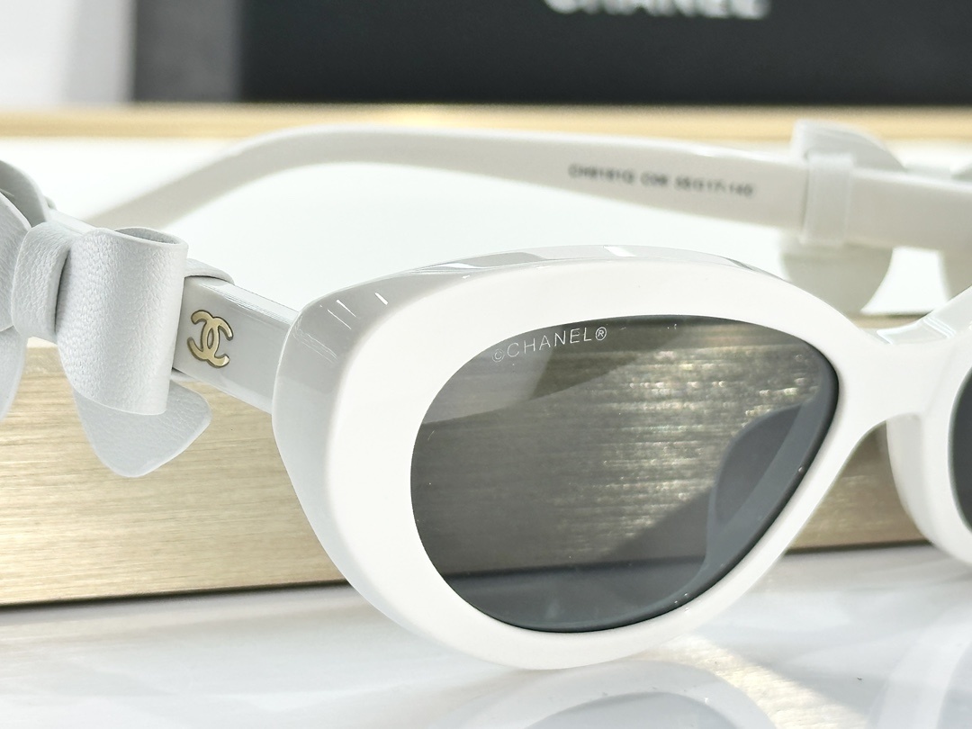 Chanel White Oval Sunglasses with Bow Detail & Gold CC Logo