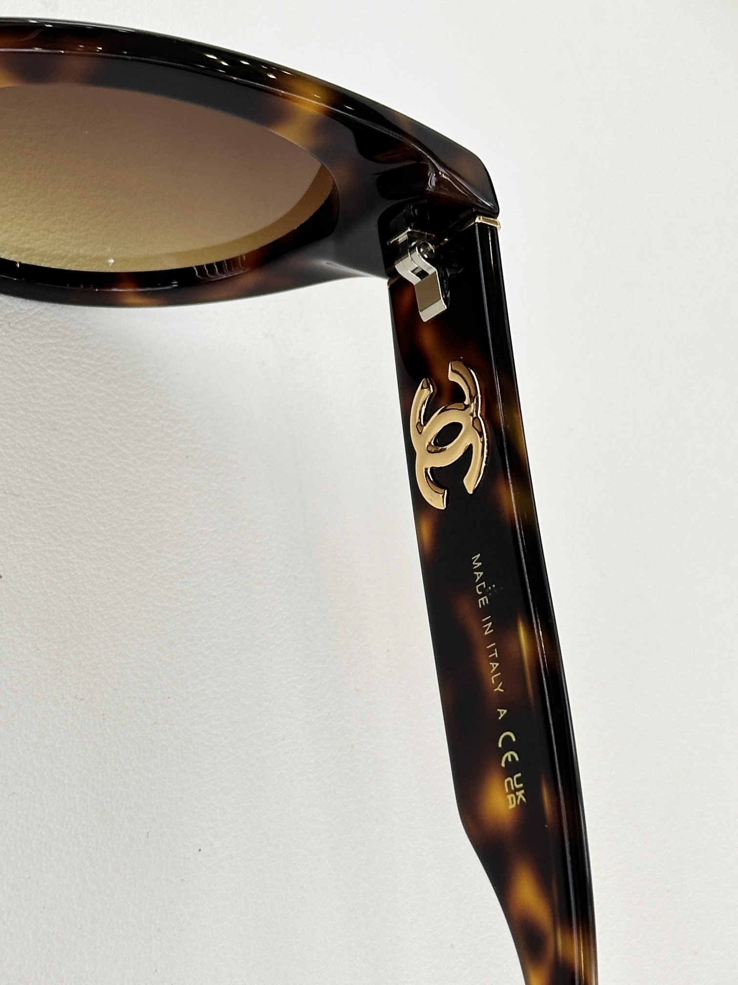 Chanel Women's Polarized Cat-Eye Sunglasses with Iconic CC Logo