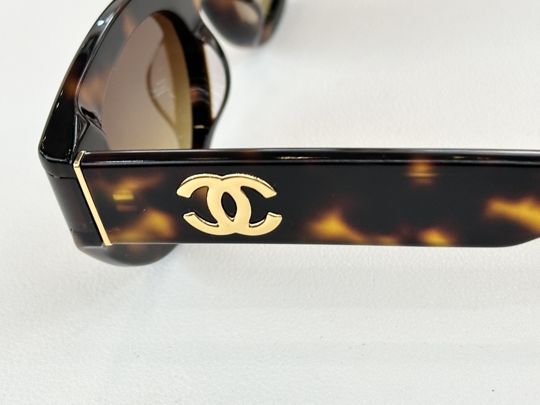 Chanel Women's Polarized Cat-Eye Sunglasses with Iconic CC Logo