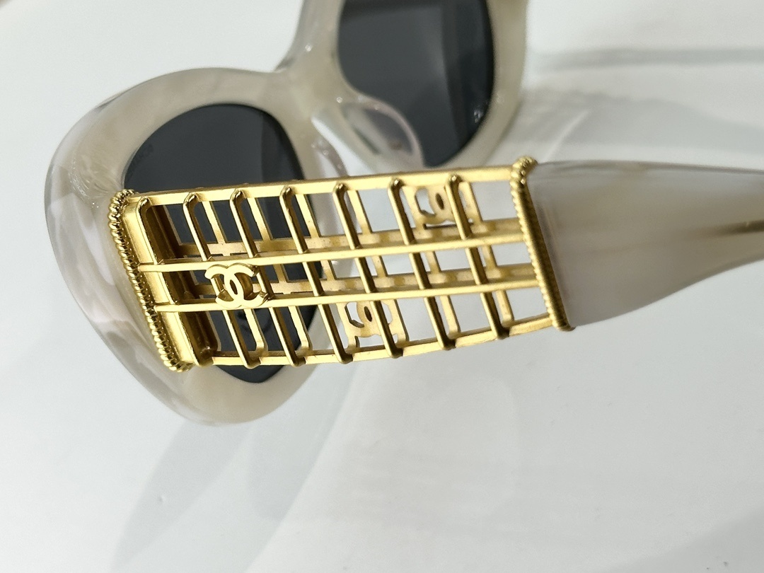 Chanel Luxury Cat-Eye Sunglasses with Gold Filigree CC Logo