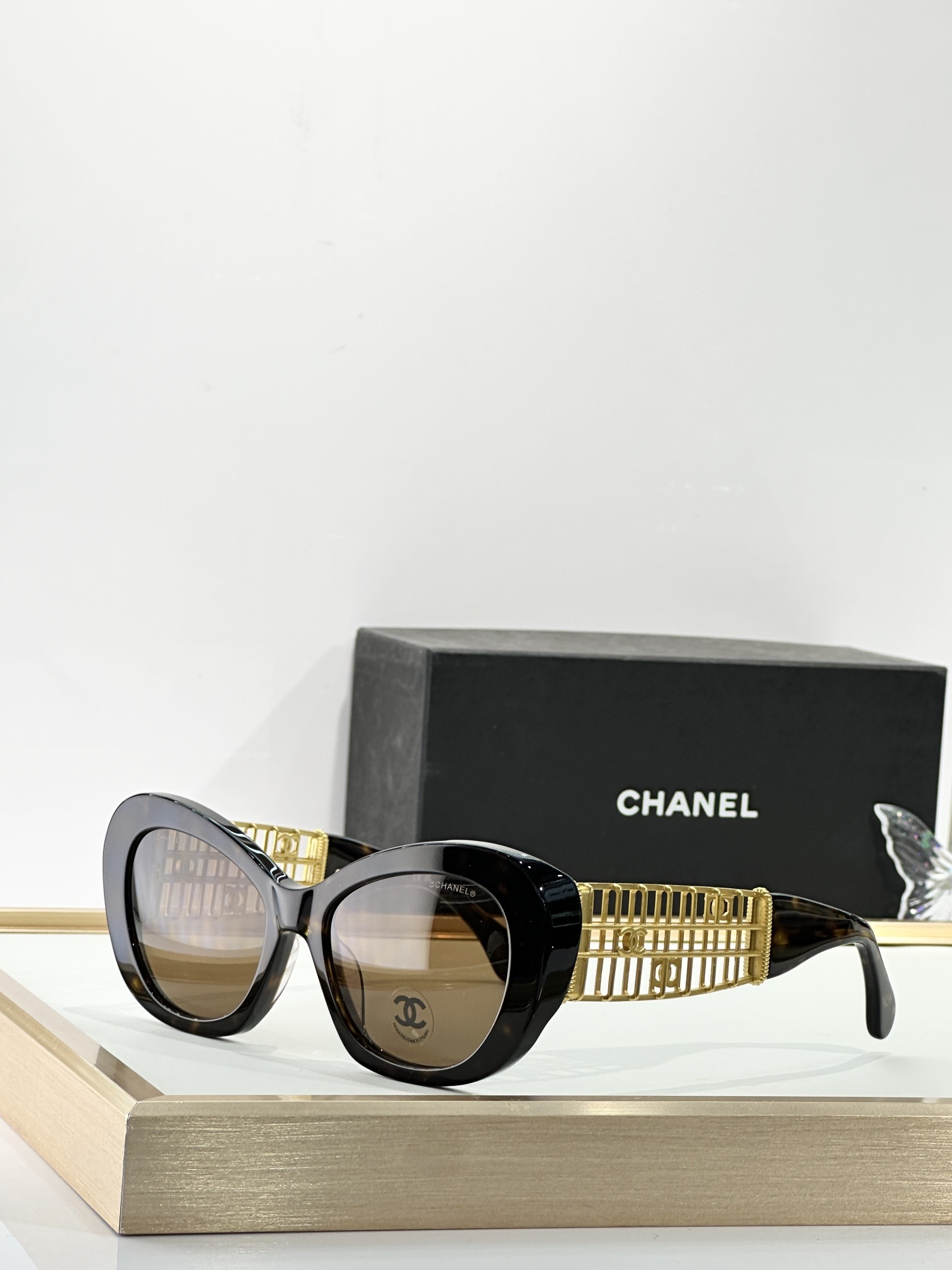 Chanel Luxury Cat-Eye Sunglasses with Gold Filigree CC Logo