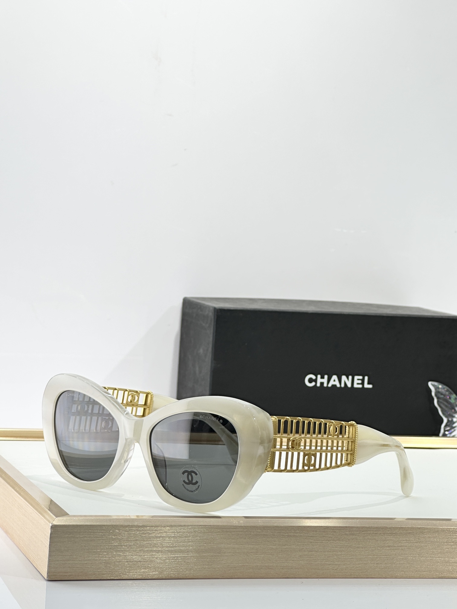 Chanel Luxury Cat-Eye Sunglasses with Gold Filigree CC Logo