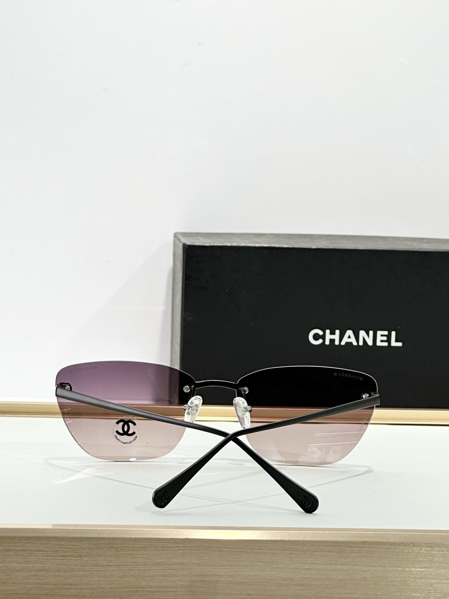 Chanel Luxury Rimless Butterfly Sunglasses - Elegant CC Logo