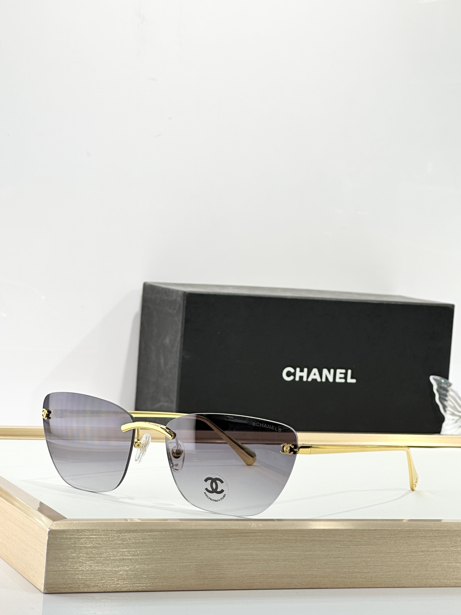 Chanel Luxury Rimless Butterfly Sunglasses - Elegant CC Logo