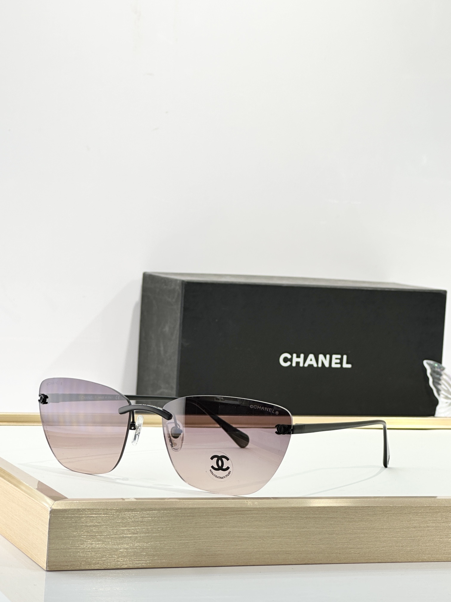 Chanel Luxury Rimless Butterfly Sunglasses - Elegant CC Logo