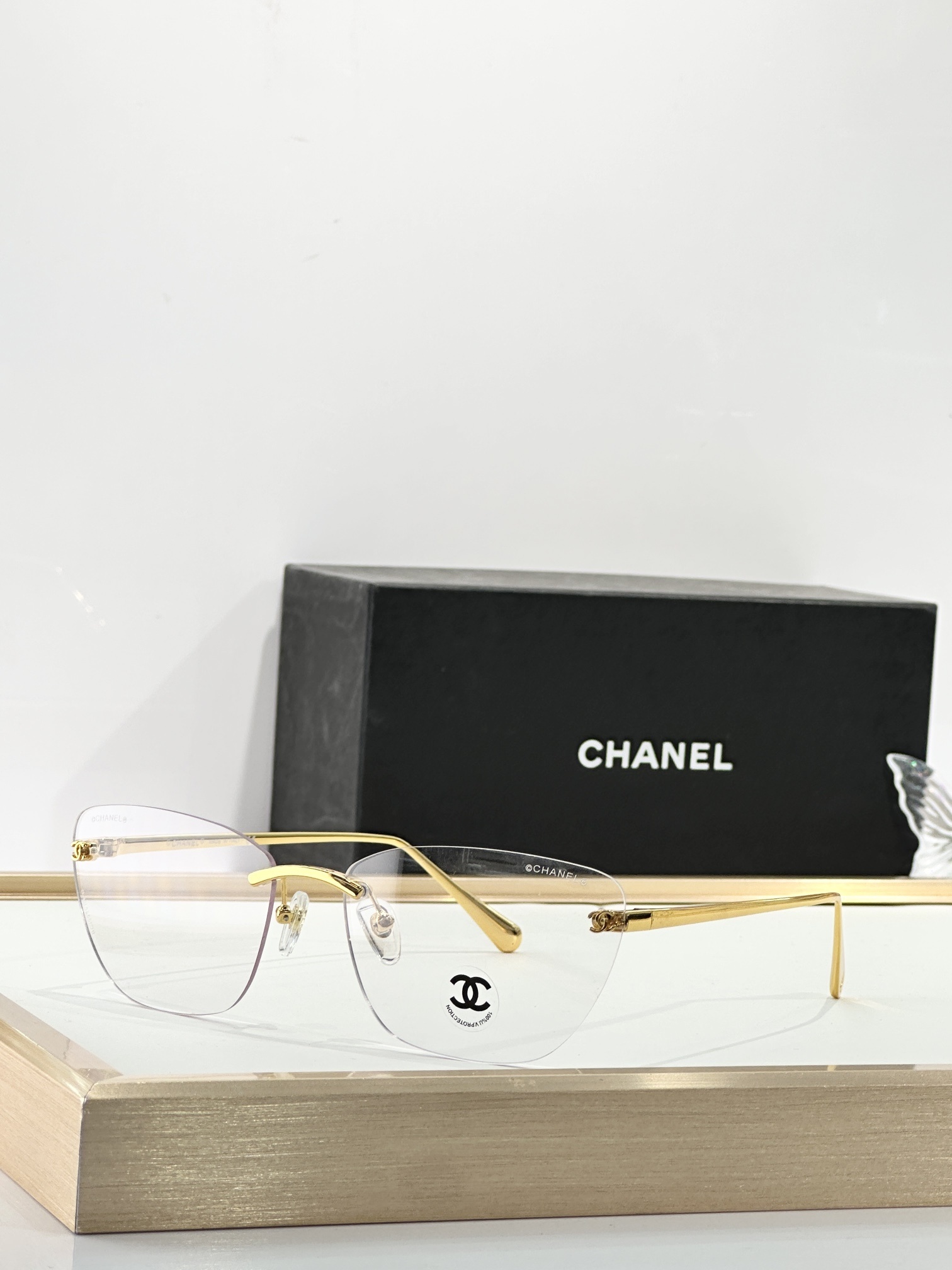 Chanel Luxury Rimless Butterfly Sunglasses - Elegant CC Logo