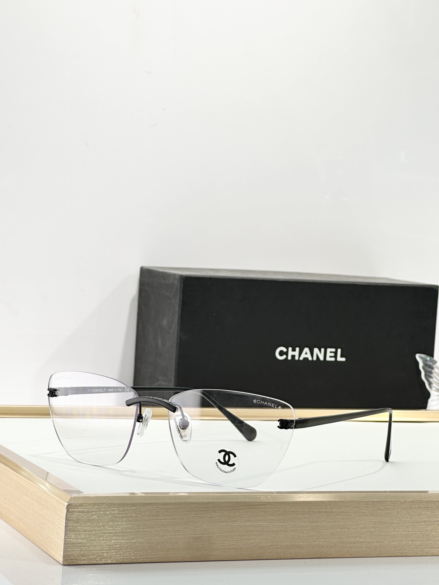 Chanel Luxury Rimless Butterfly Sunglasses - Elegant CC Logo