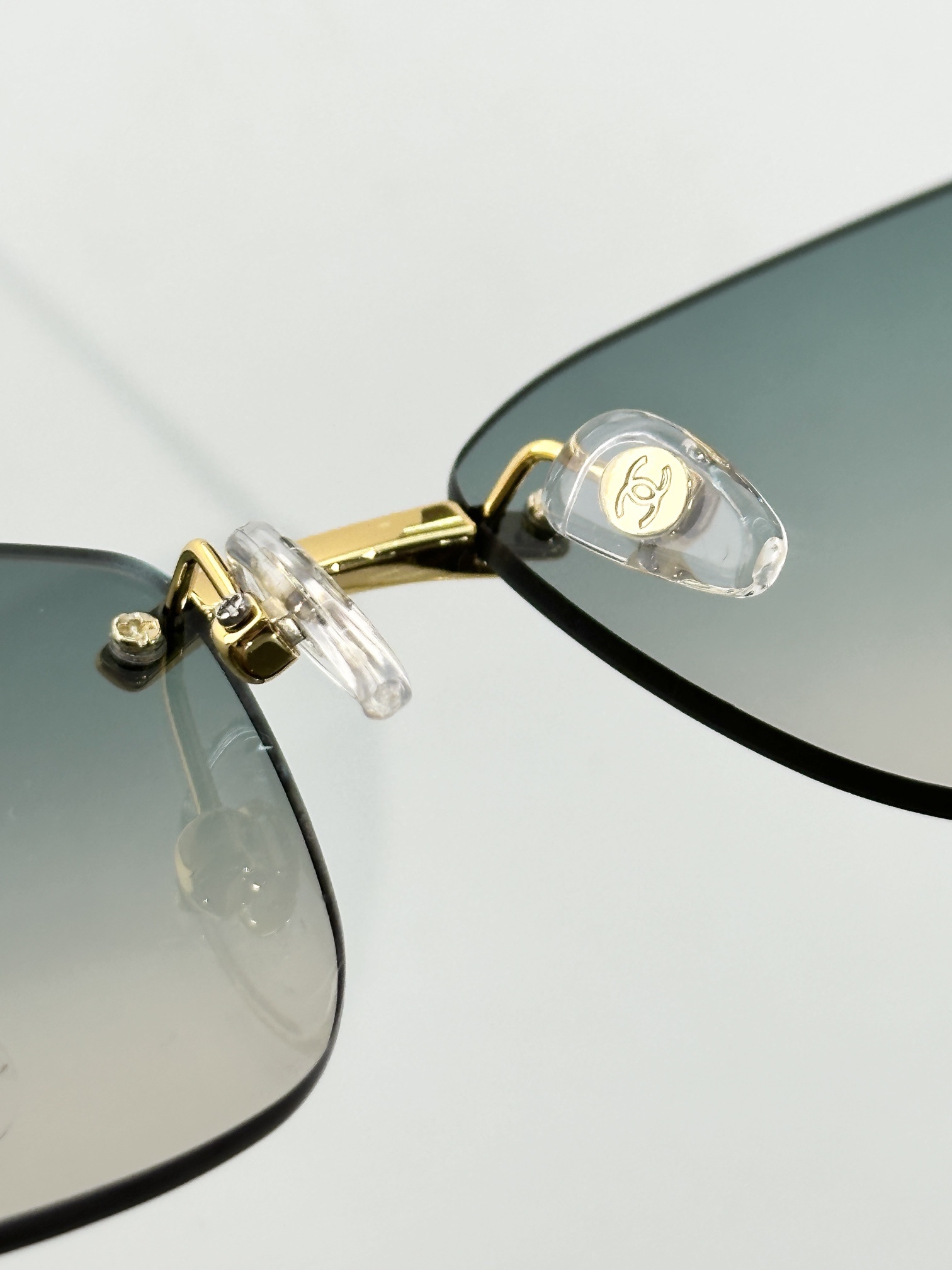 Chanel Luxury Rimless Butterfly Sunglasses - Gold & Gradient Blue