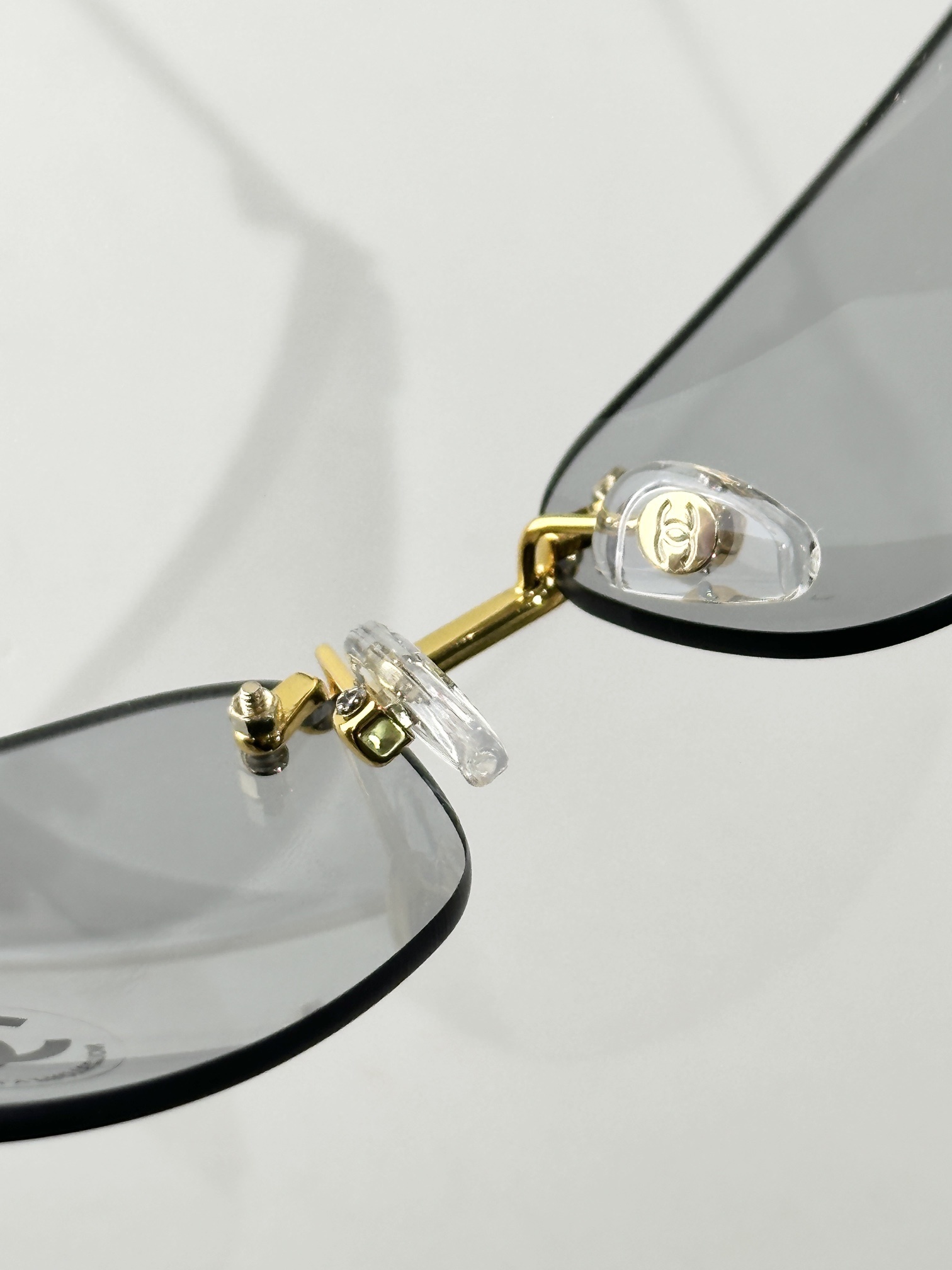 Chanel Rimless Oval Sunglasses - Gold & Crystal CC Logo