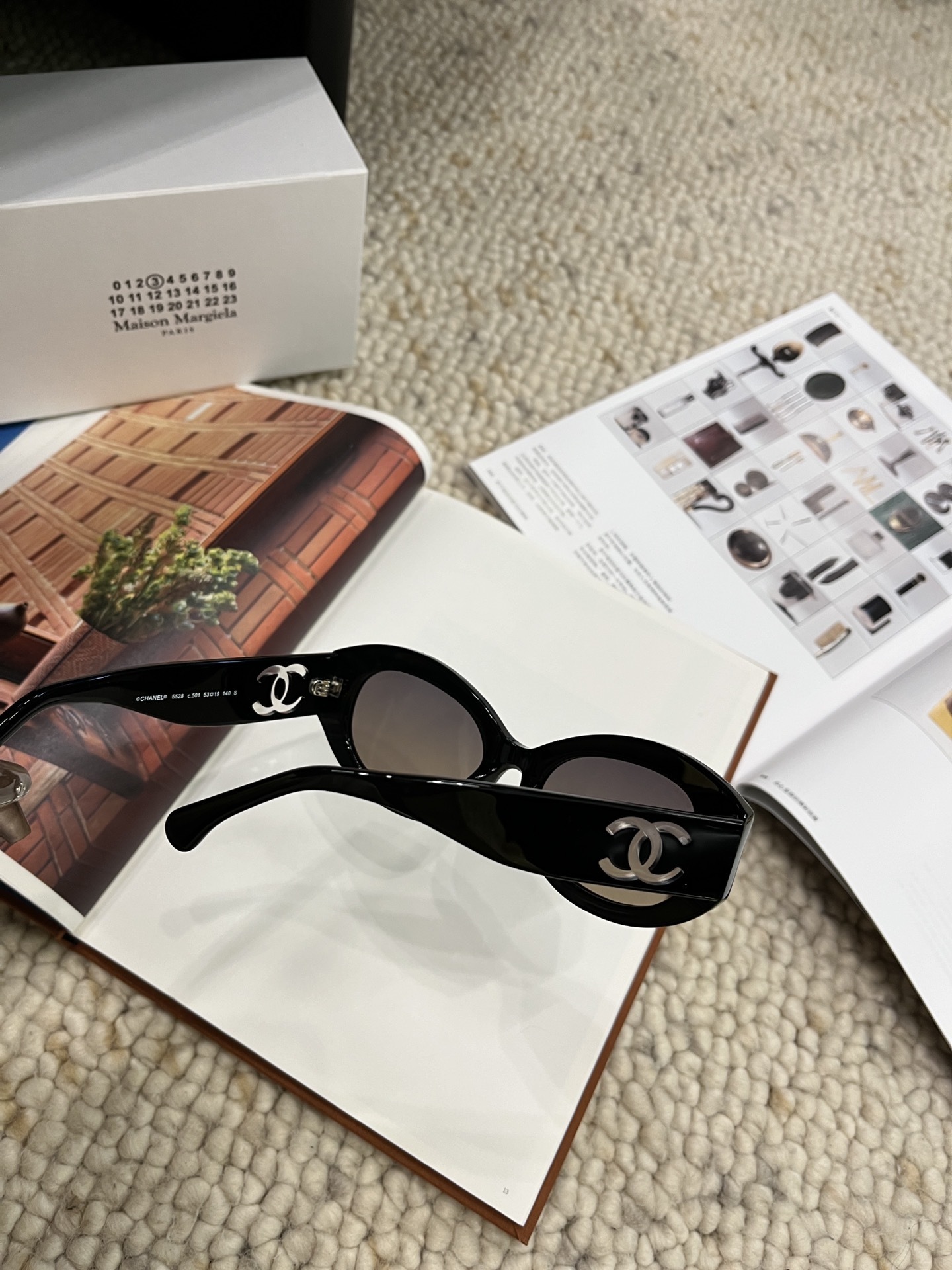 Chanel Black Oval Sunglasses with Signature CC Logo - Luxury Eyewear