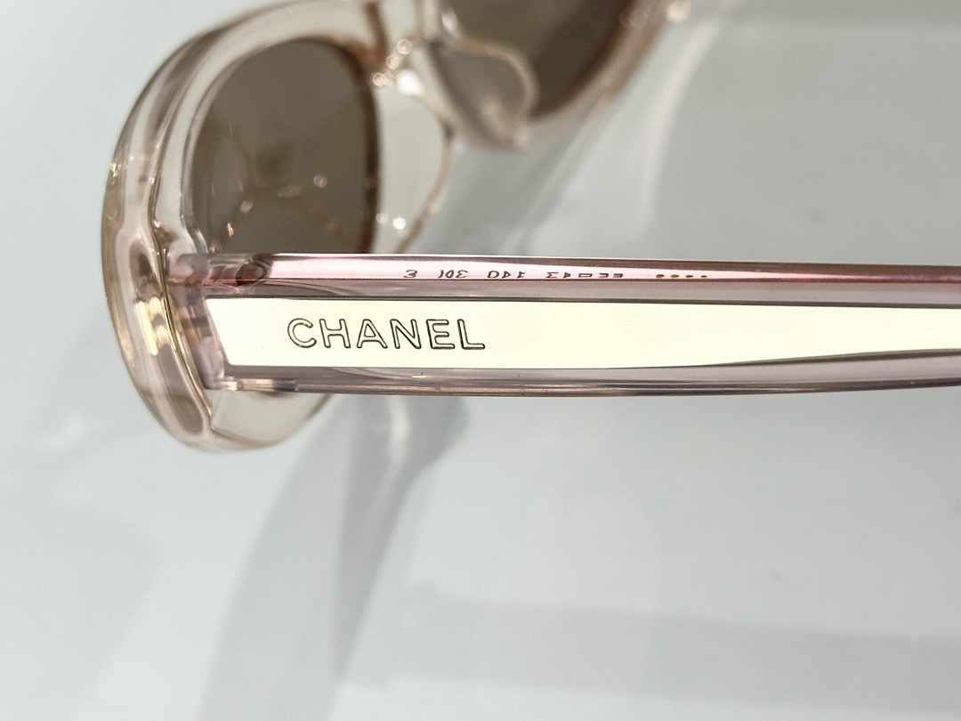 Chanel Luxury Oval Sunglasses in Light Pink with Gold Mirrored Lenses