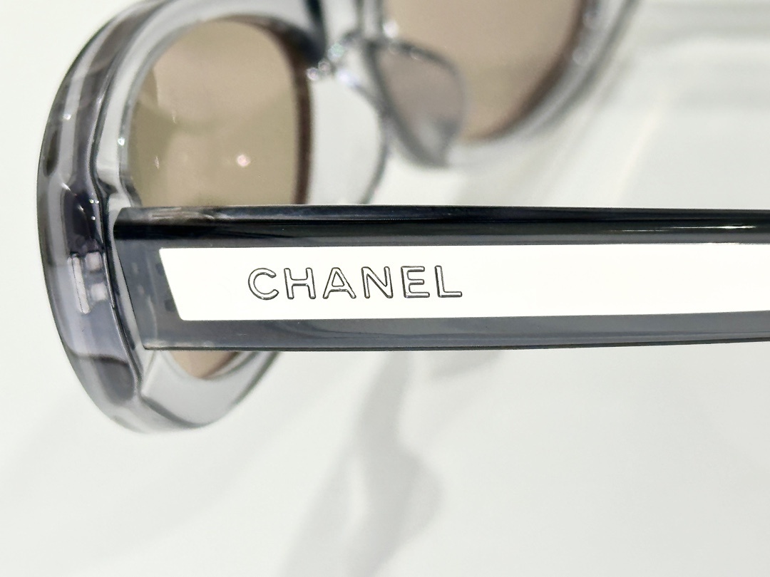 Chanel Oval Sunglasses - Transparent Grey Frame & Gold Mirror Lens