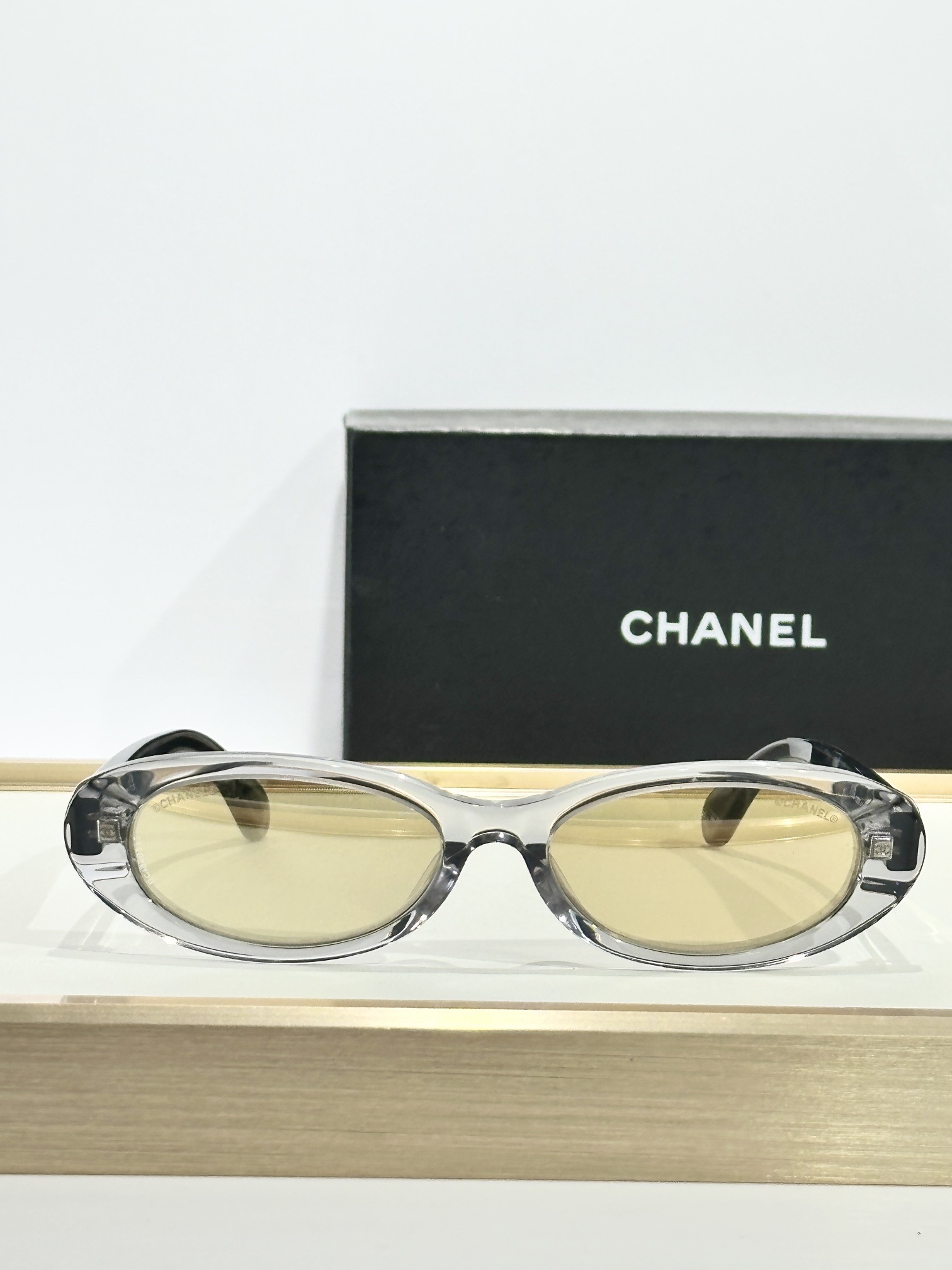Chanel Oval Sunglasses - Transparent Grey Frame & Gold Mirror Lens