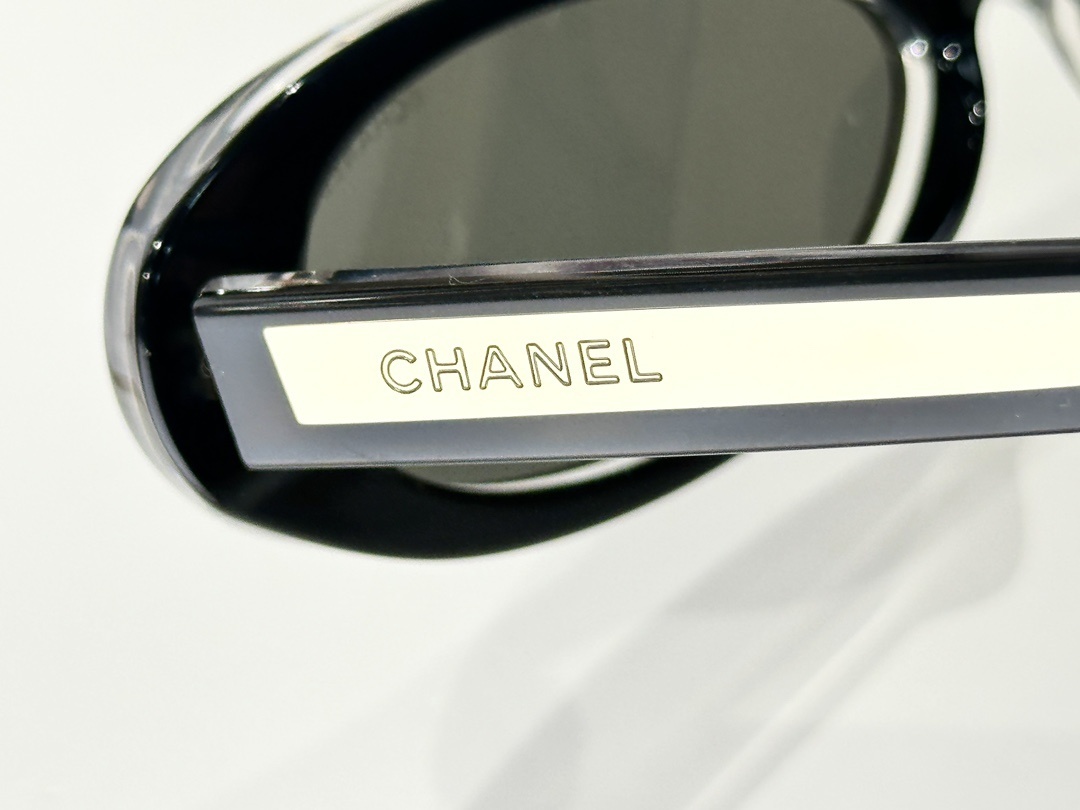 Chanel Luxury Oval Sunglasses - Black & White Vintage Style