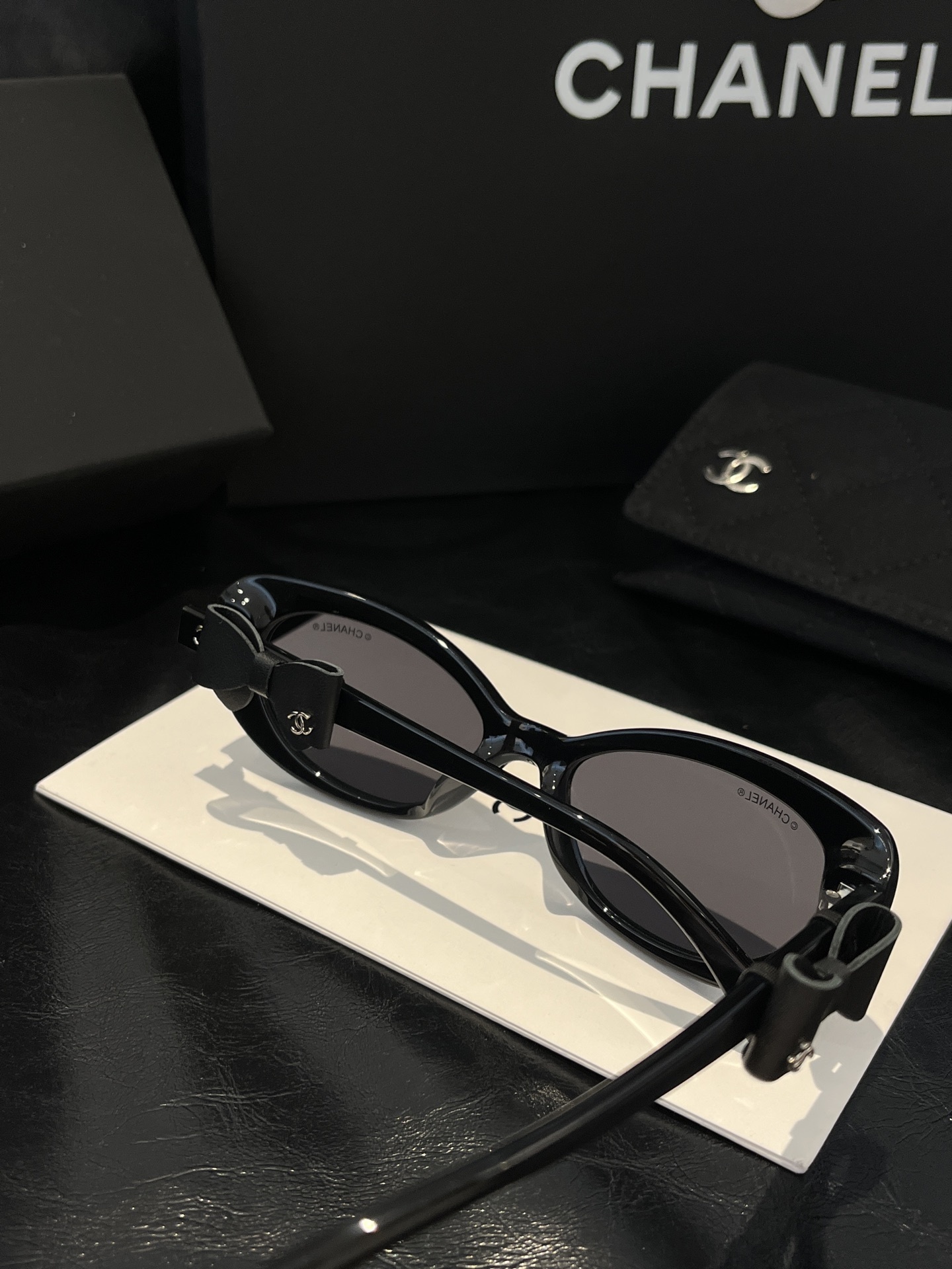 Chanel Black Oval Sunglasses with Bow Detail & CC Logo