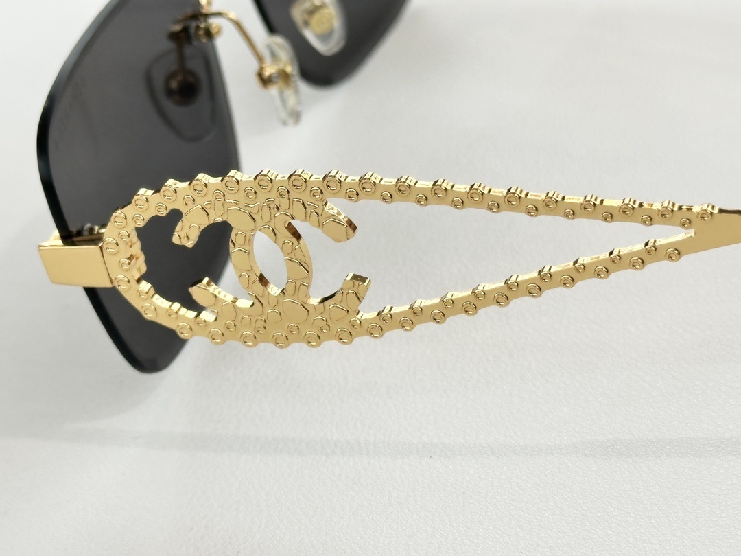 Chanel Luxury Rimless Sunglasses - Crystal CC Logo Temples