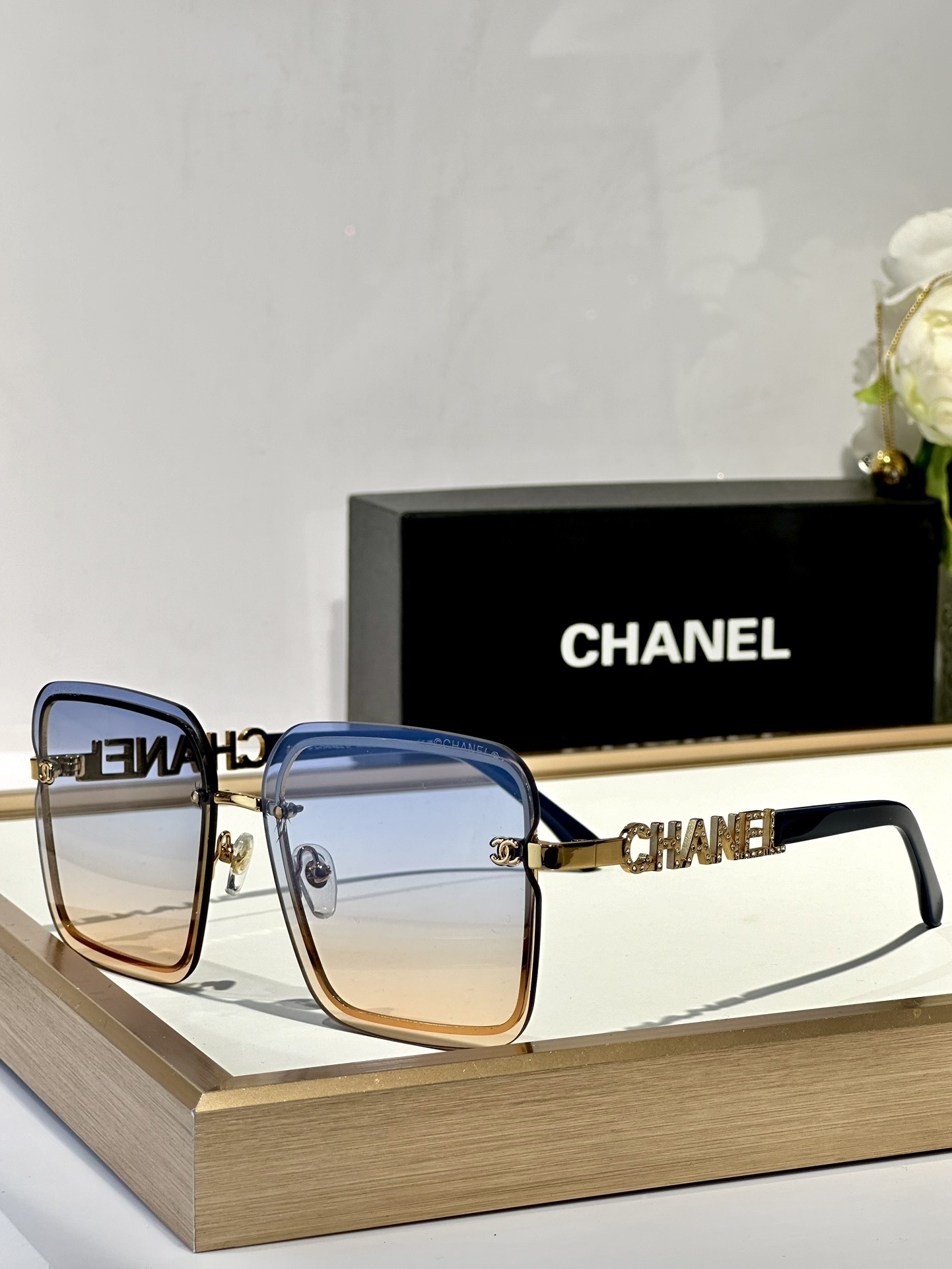 Chanel Luxury Square Rimless Sunglasses with Crystal Logo