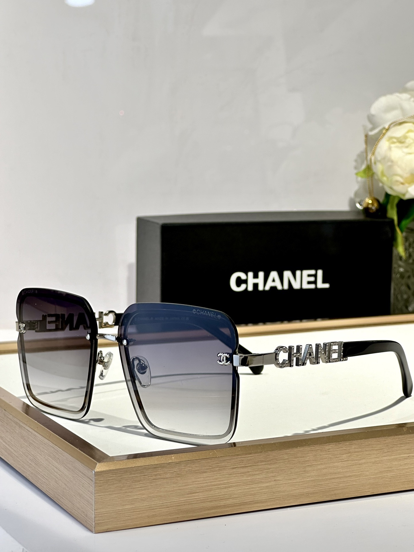 Chanel Luxury Square Rimless Sunglasses with Crystal Logo
