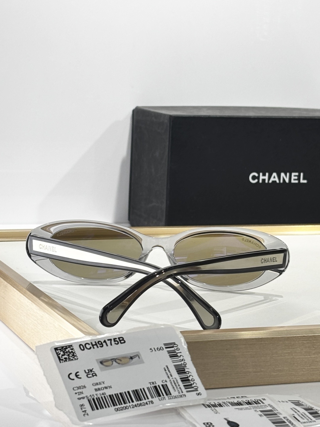 Chanel Oval Sunglasses - Transparent Grey & Gold Mirrored Lenses