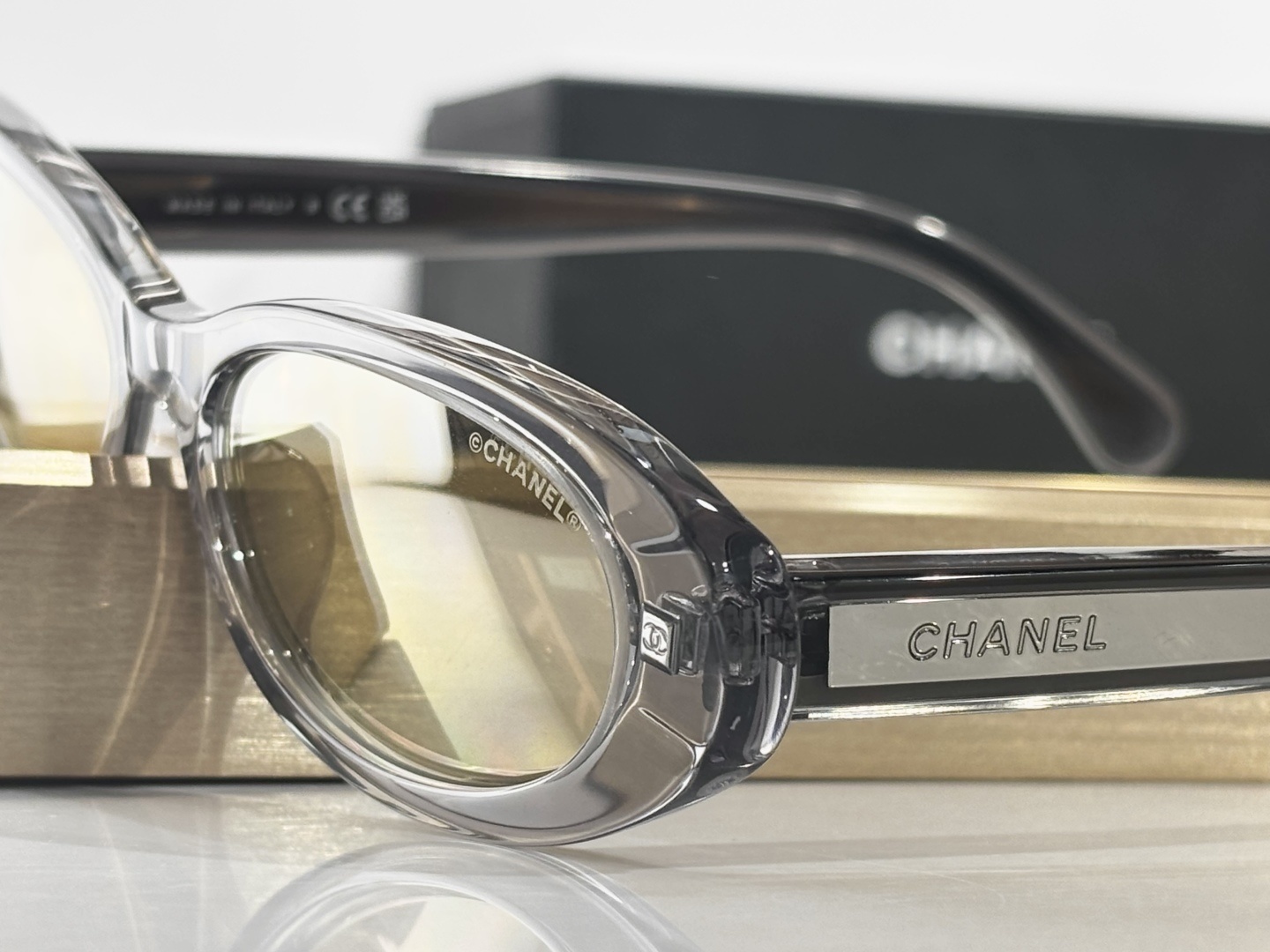Chanel Oval Sunglasses - Transparent Grey & Gold Mirrored Lenses