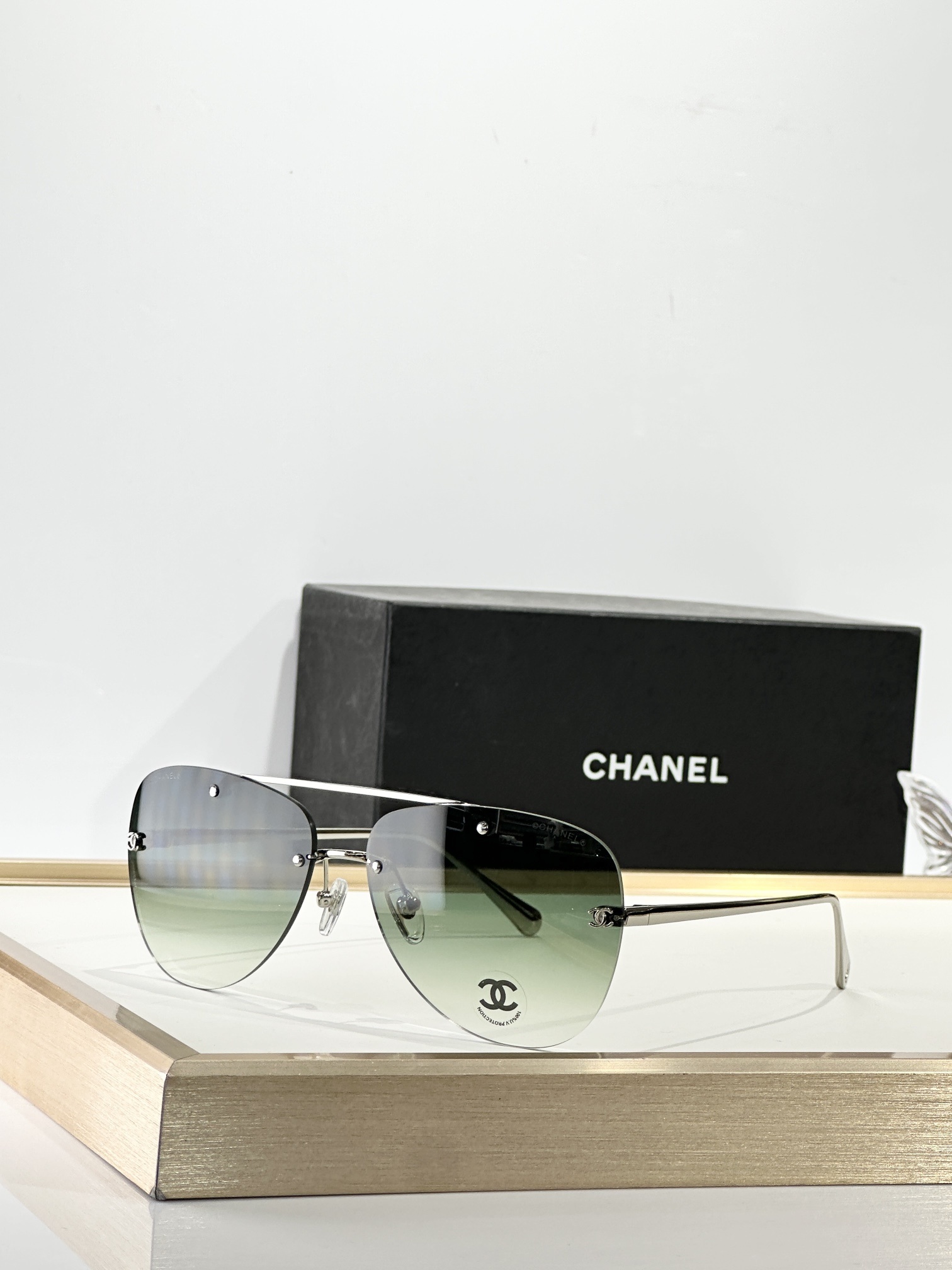 Chanel Luxury Rimless Aviator Eyewear - Designer Gold & Black