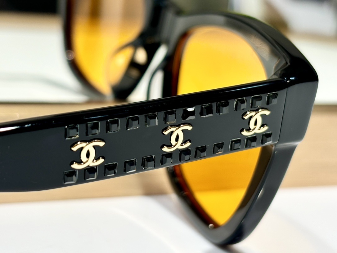 Chanel Black Cat-Eye Sunglasses with Gold CC Logo & Yellow Lenses