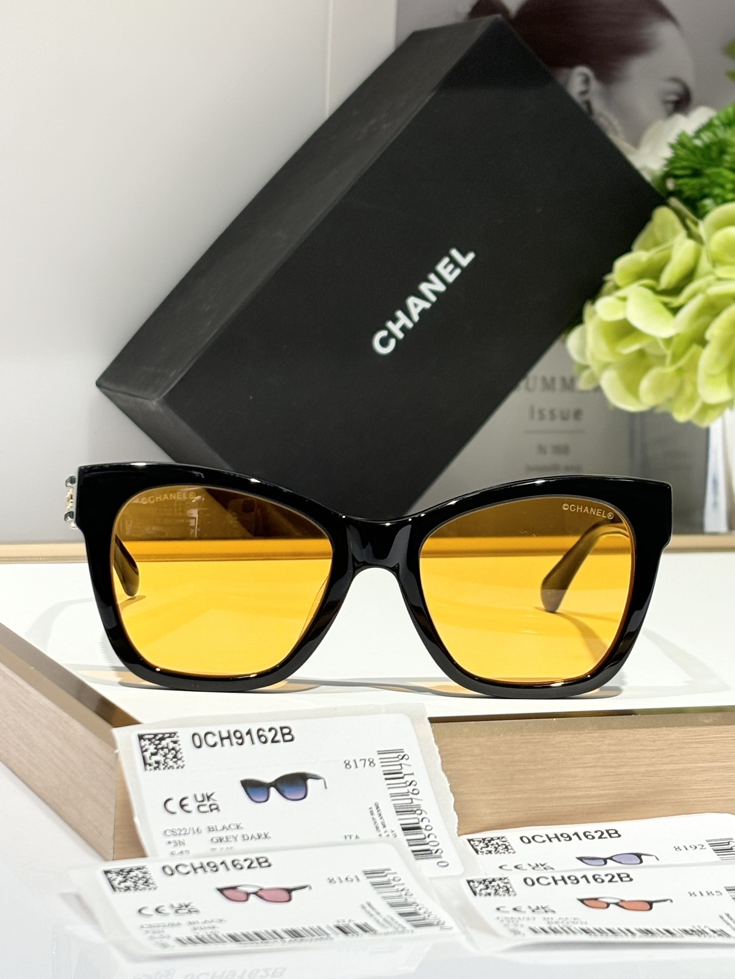 Chanel Black Cat-Eye Sunglasses with Gold CC Logo & Yellow Lenses