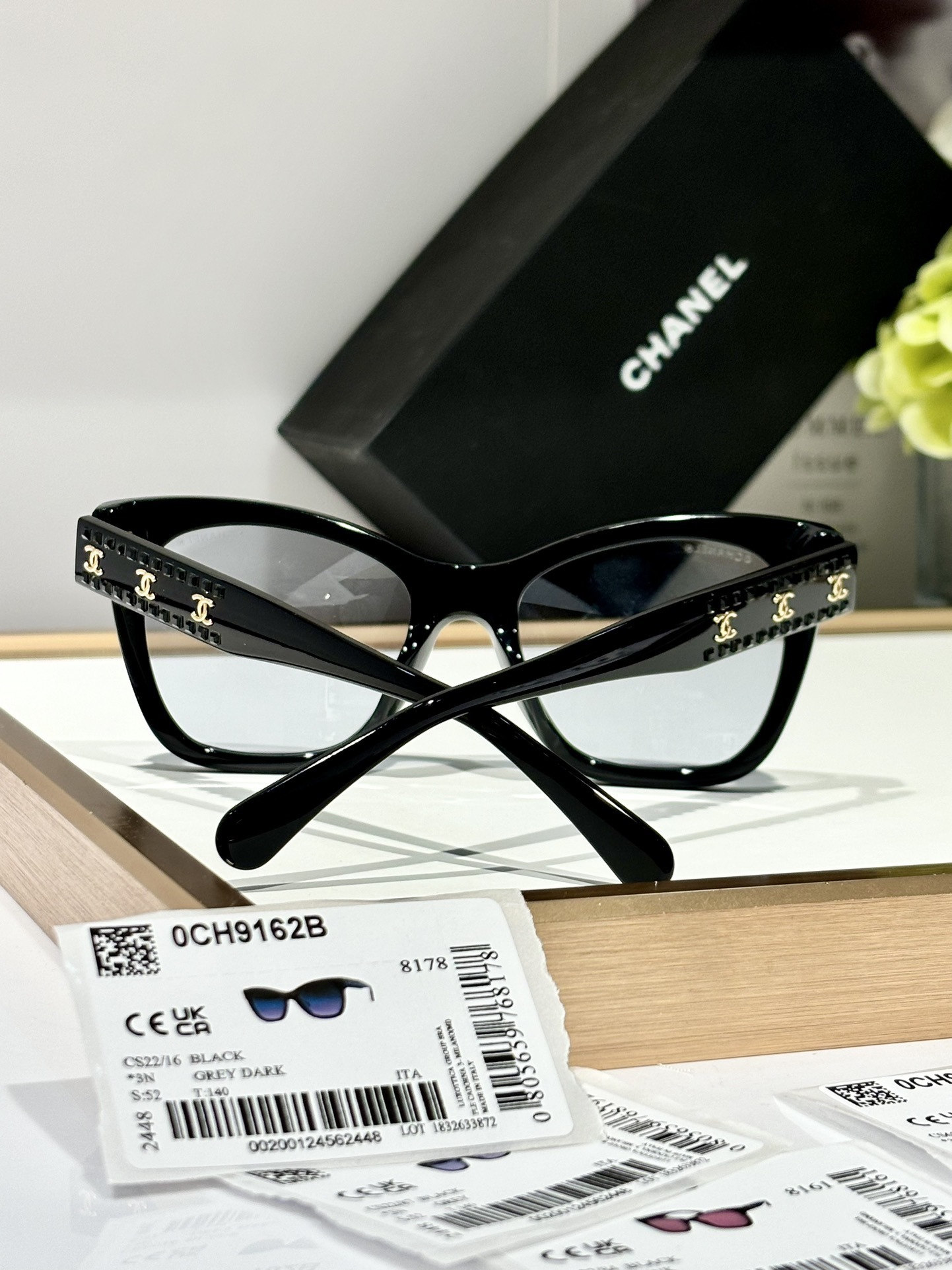 Chanel Black Cat-Eye Sunglasses with Gold CC Logo Temples