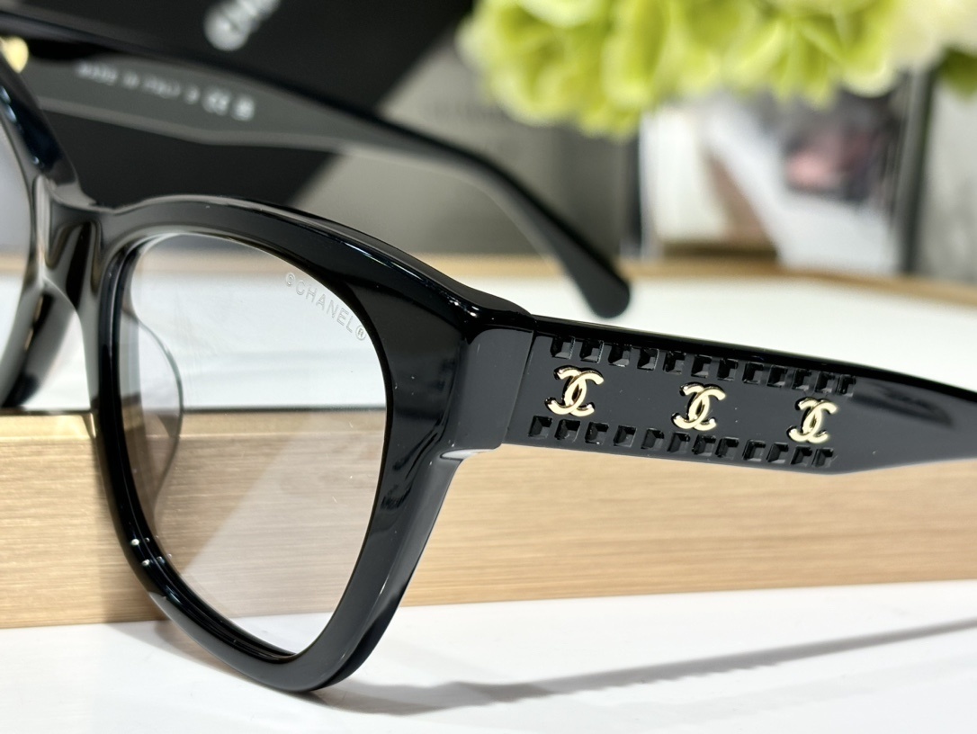 Chanel Black Cat-Eye Sunglasses with Gold CC Logo Temples