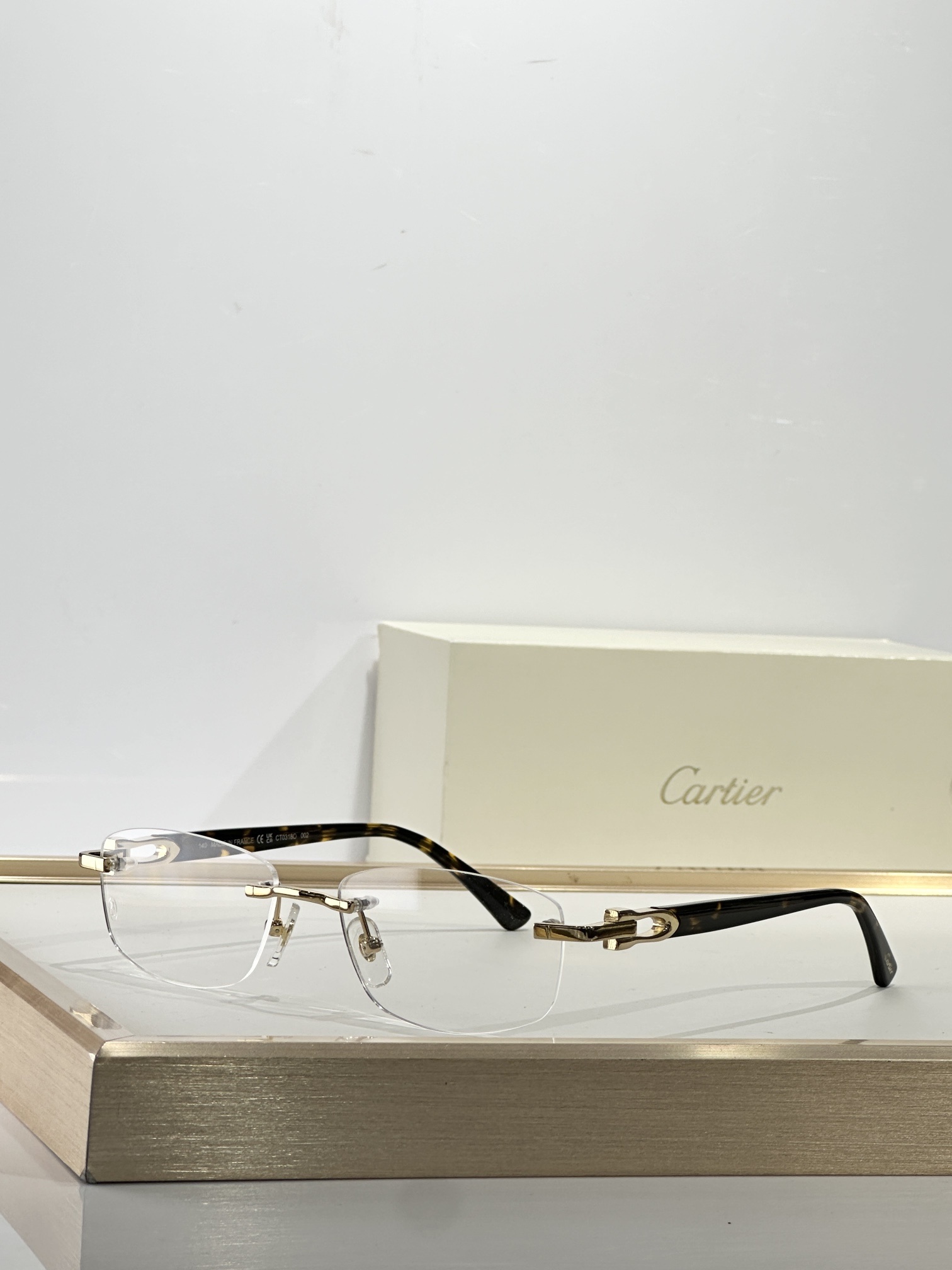 Cartier Luxury Rimless Eyeglasses - Elegant C Décor Optical Frames