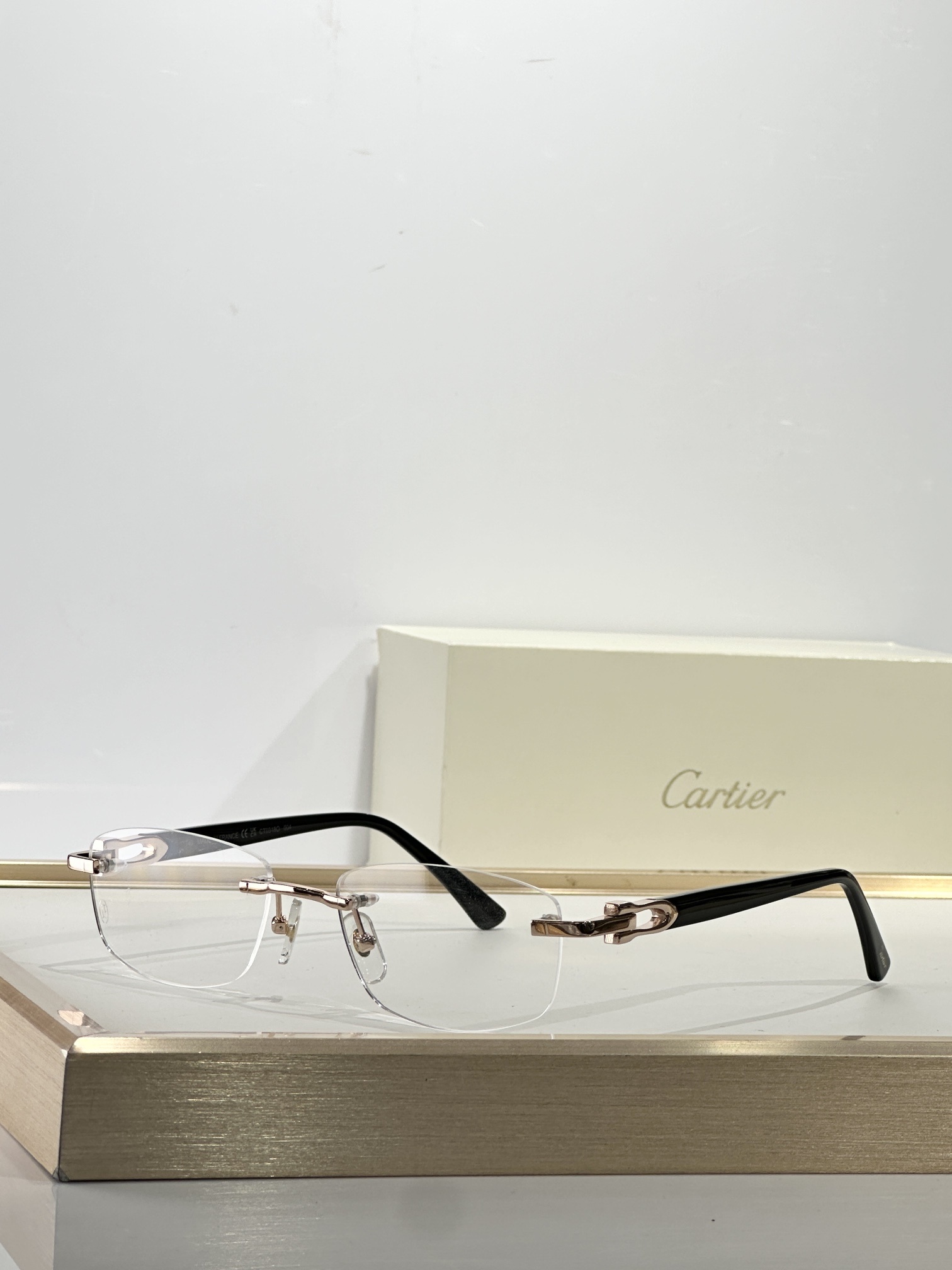 Cartier Luxury Rimless Eyeglasses – Elegant C Décor Optical Frames