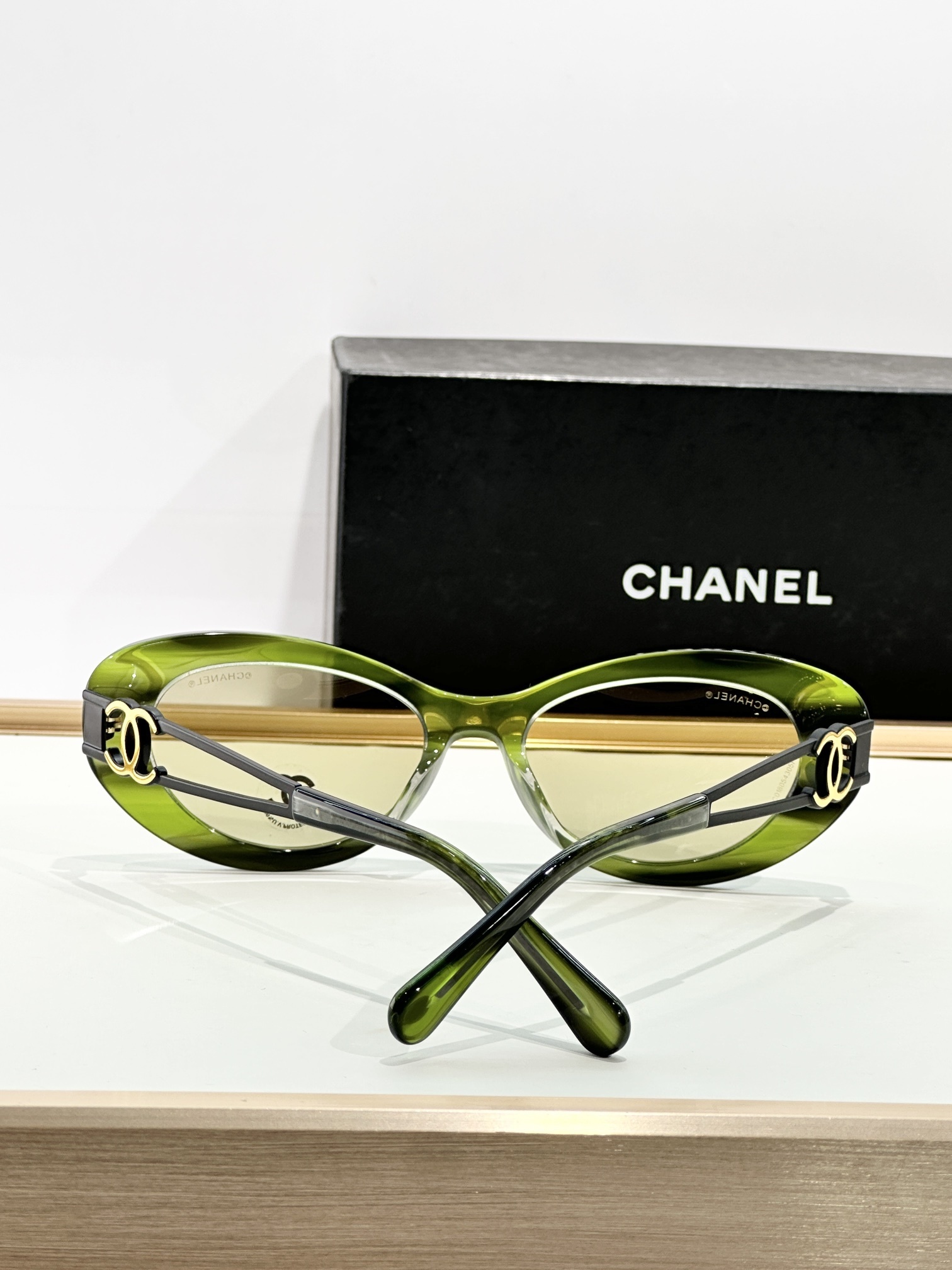Chanel Luxury Cat-Eye Sunglasses with Gold-Tone CC Logo Temples