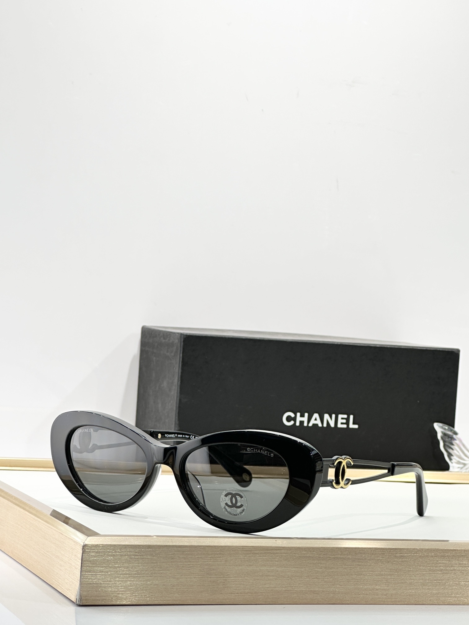 Chanel Luxury Cat-Eye Sunglasses with Gold-Tone CC Logo Temples