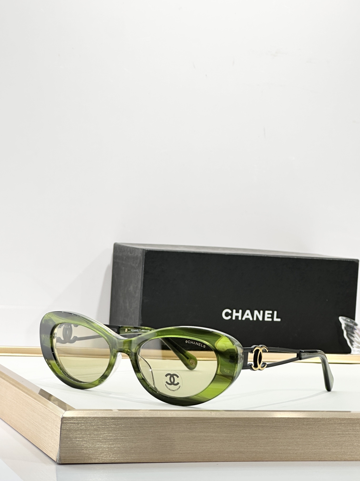 Chanel Luxury Cat-Eye Sunglasses with Gold-Tone CC Logo Temples