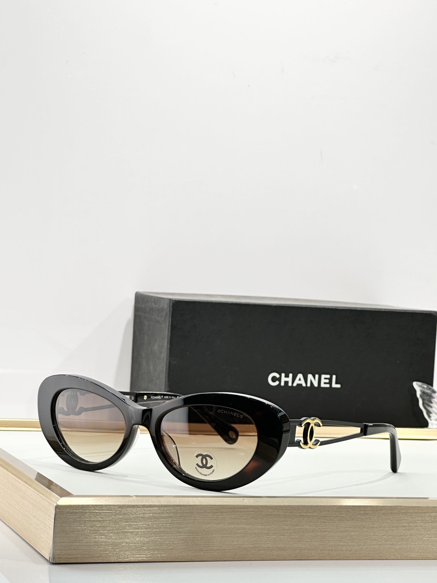 Chanel Luxury Cat-Eye Sunglasses with Gold-Tone CC Logo Temples