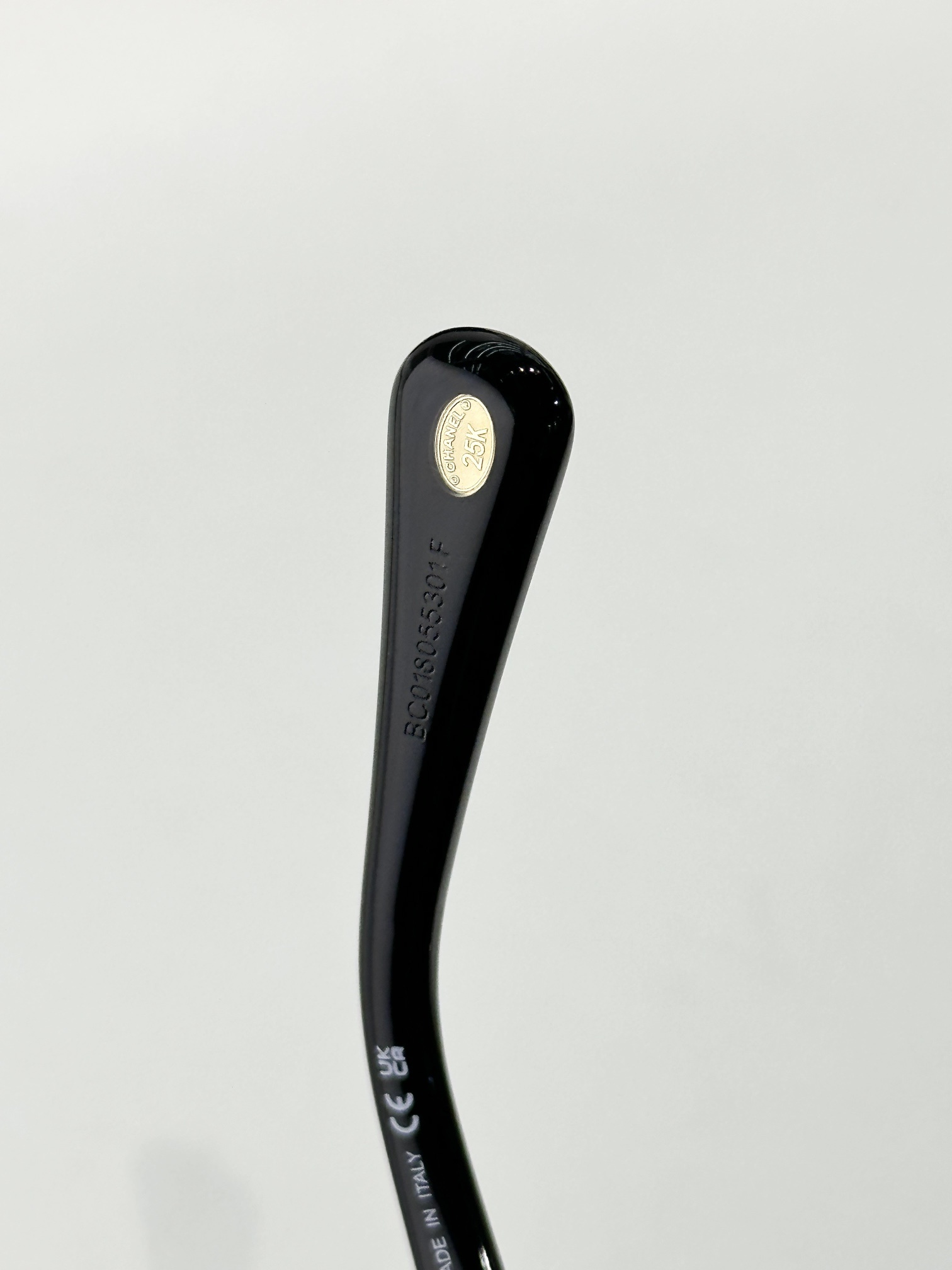 Chanel Oval Sunglasses - Black Acetate with Gold CC Logo Temples