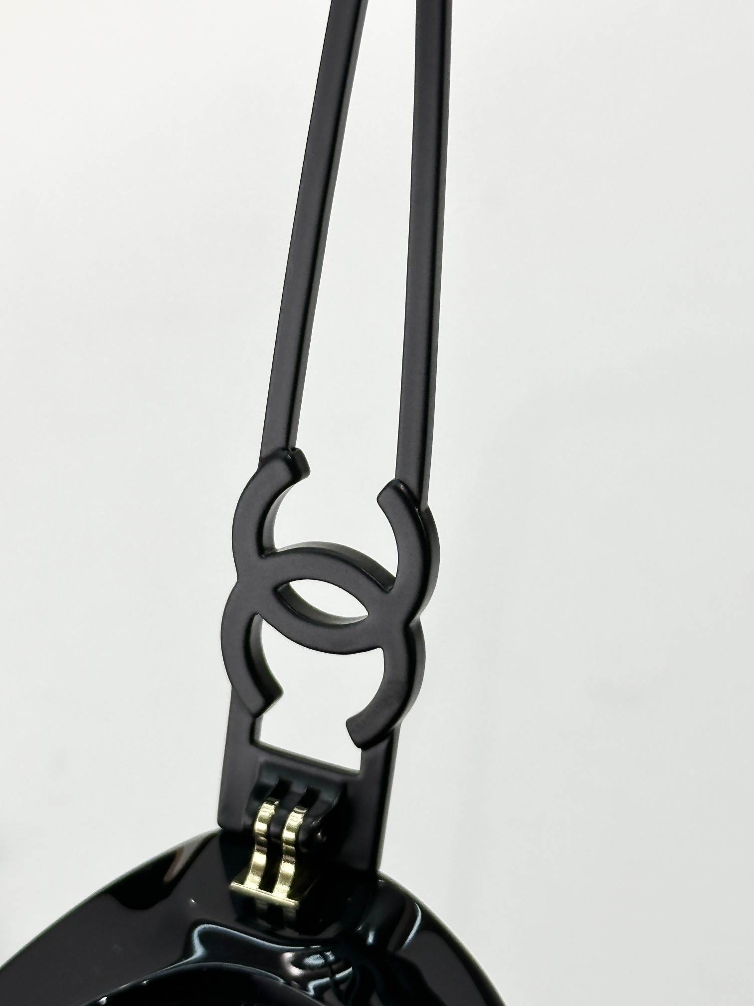 Chanel Oval Sunglasses - Black Acetate with Gold CC Logo Temples