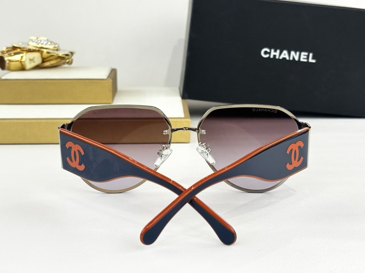 Chanel Luxury Rimless Aviator Sunglasses with CC Logo Temples