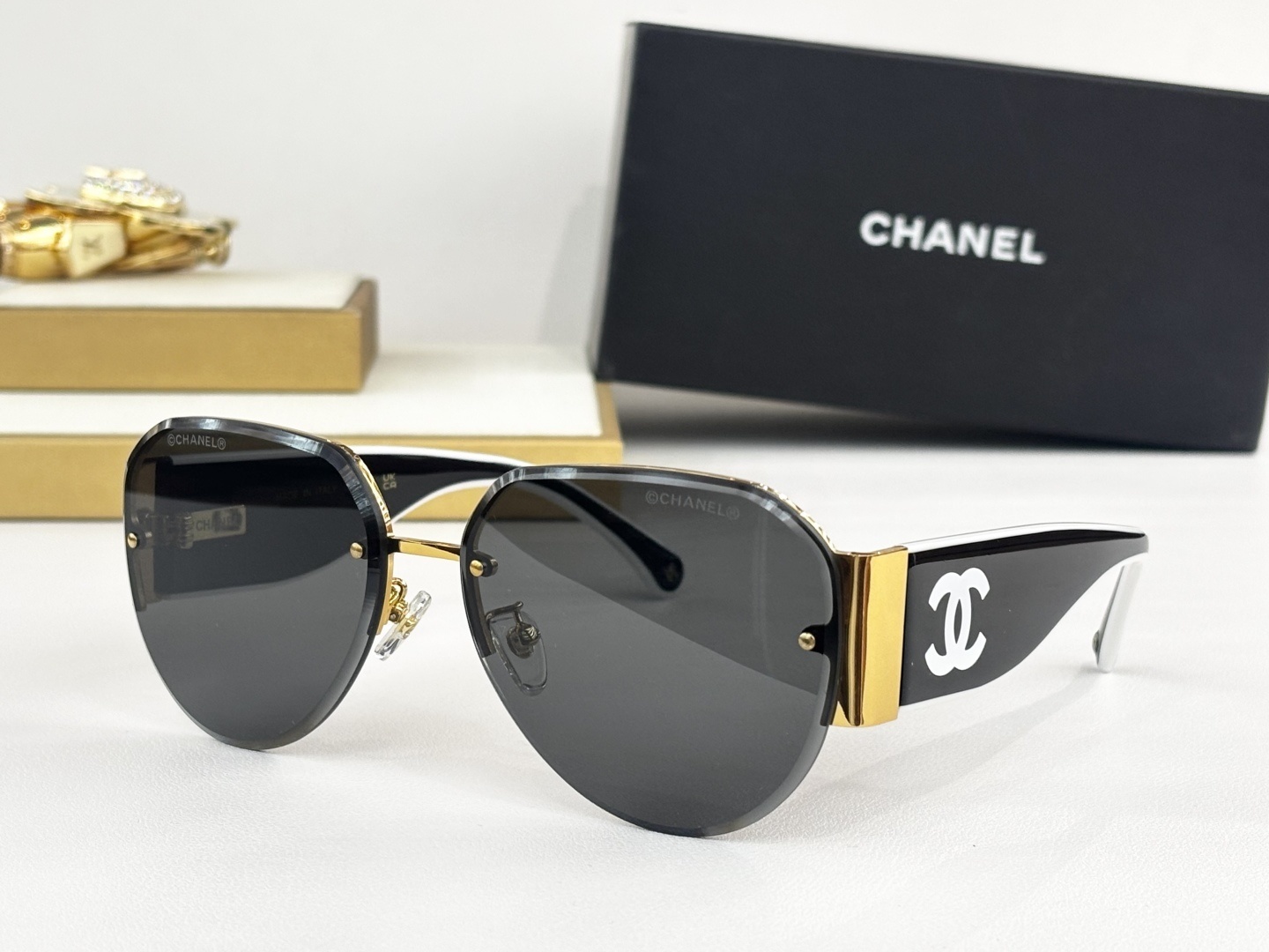 Chanel Luxury Rimless Aviator Sunglasses with CC Logo Temples