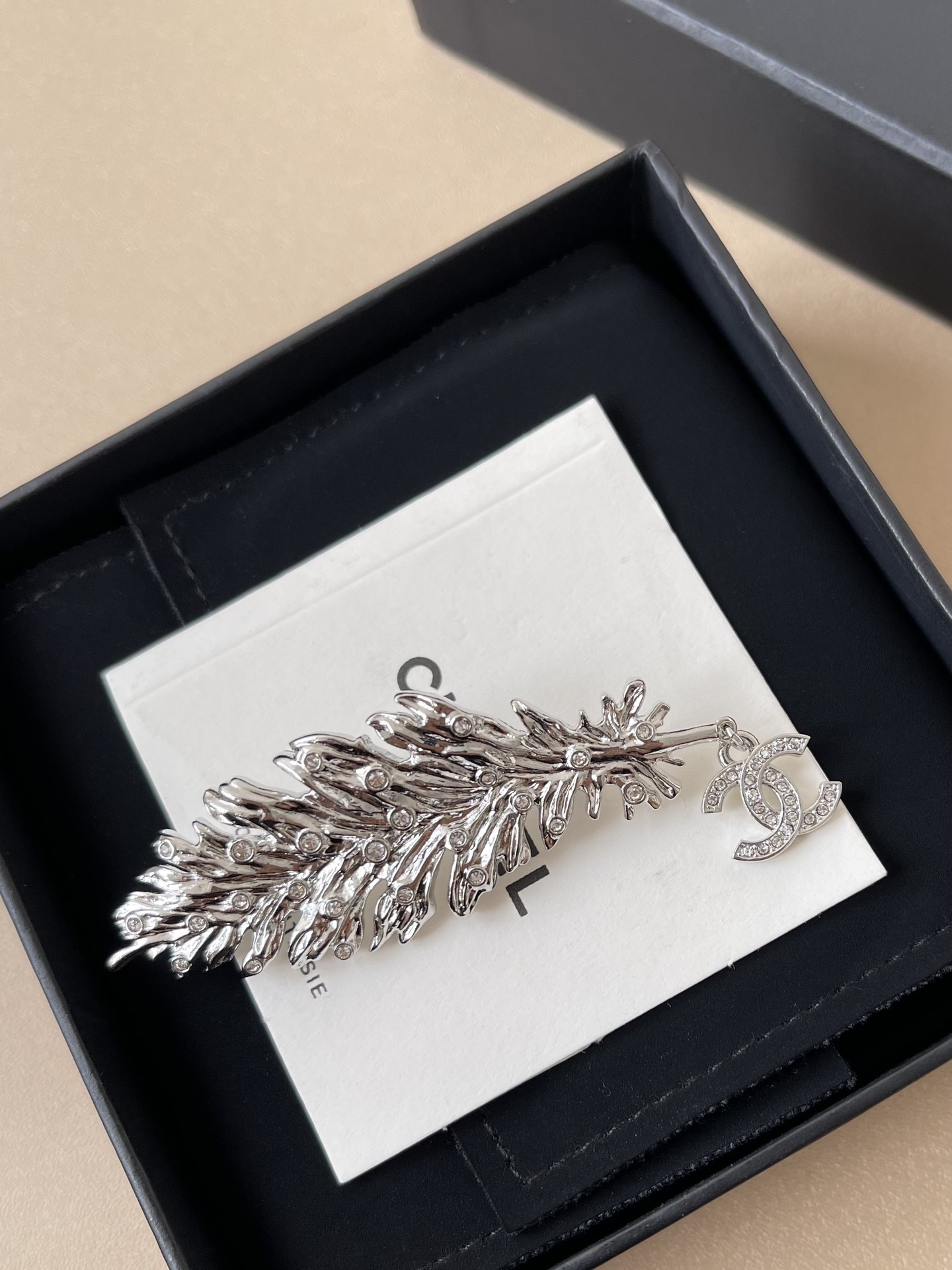 Luxury Crystal Feather Brooch with Interlocking C Logo Charm