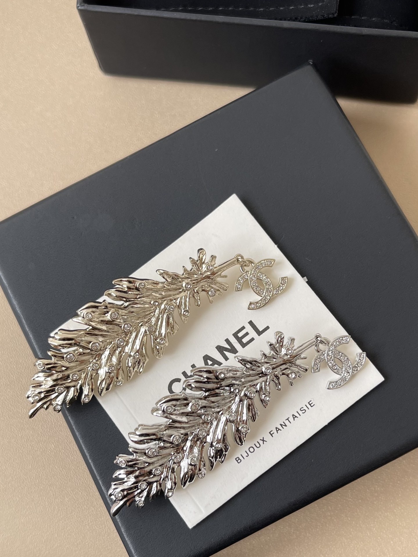 Luxury Crystal Feather Brooch with Interlocking C Logo Charm