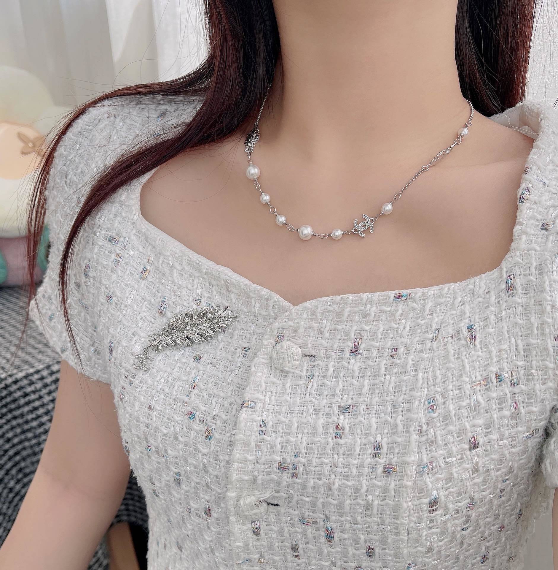 Luxury Crystal Feather Brooch with Interlocking C Logo Charm