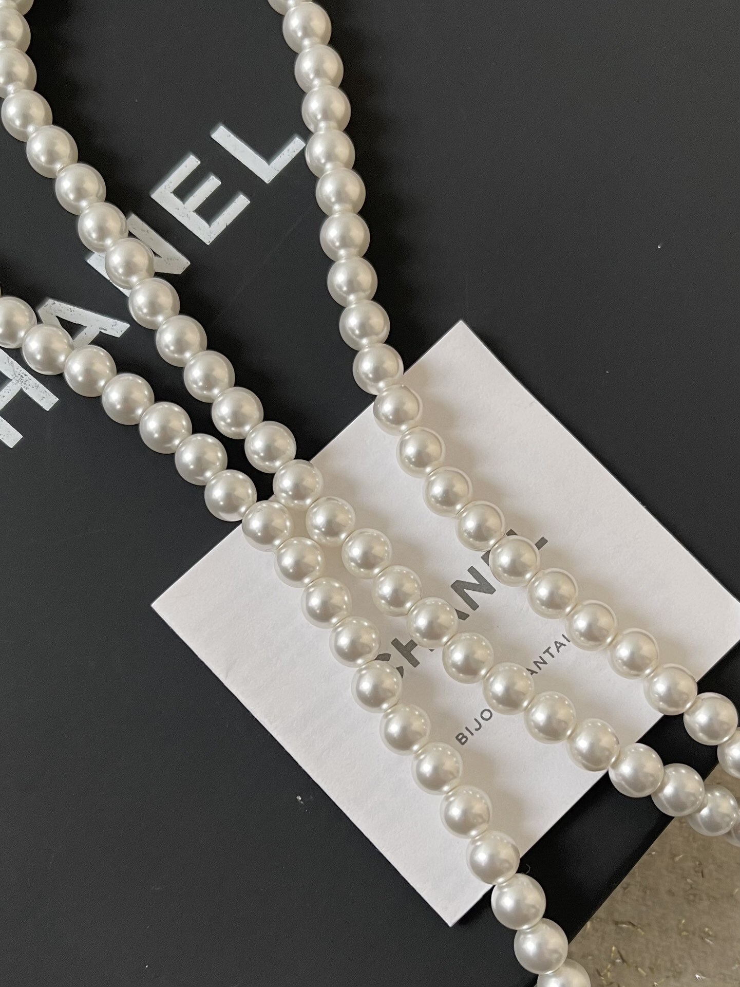 Luxury Long Pearl Necklace with Iconic CC Logo Accents