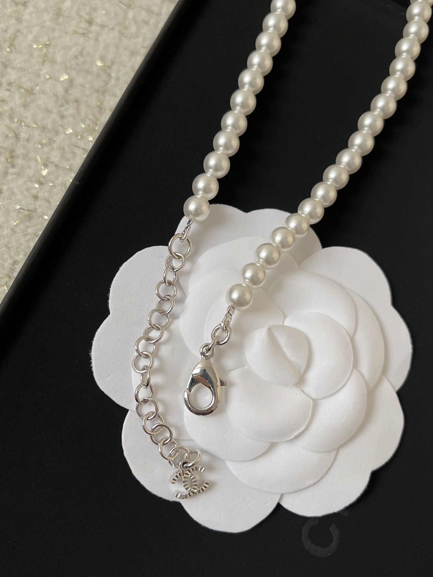 Luxury Long Pearl Necklace with Iconic CC Logo Accents
