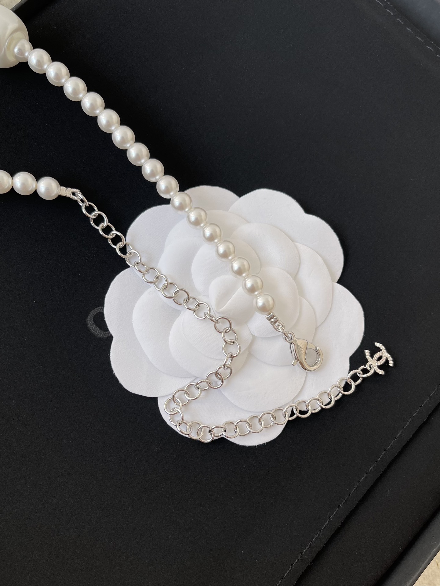 Chanel Elegant Pearl Bow Necklace with CC Logo Charms