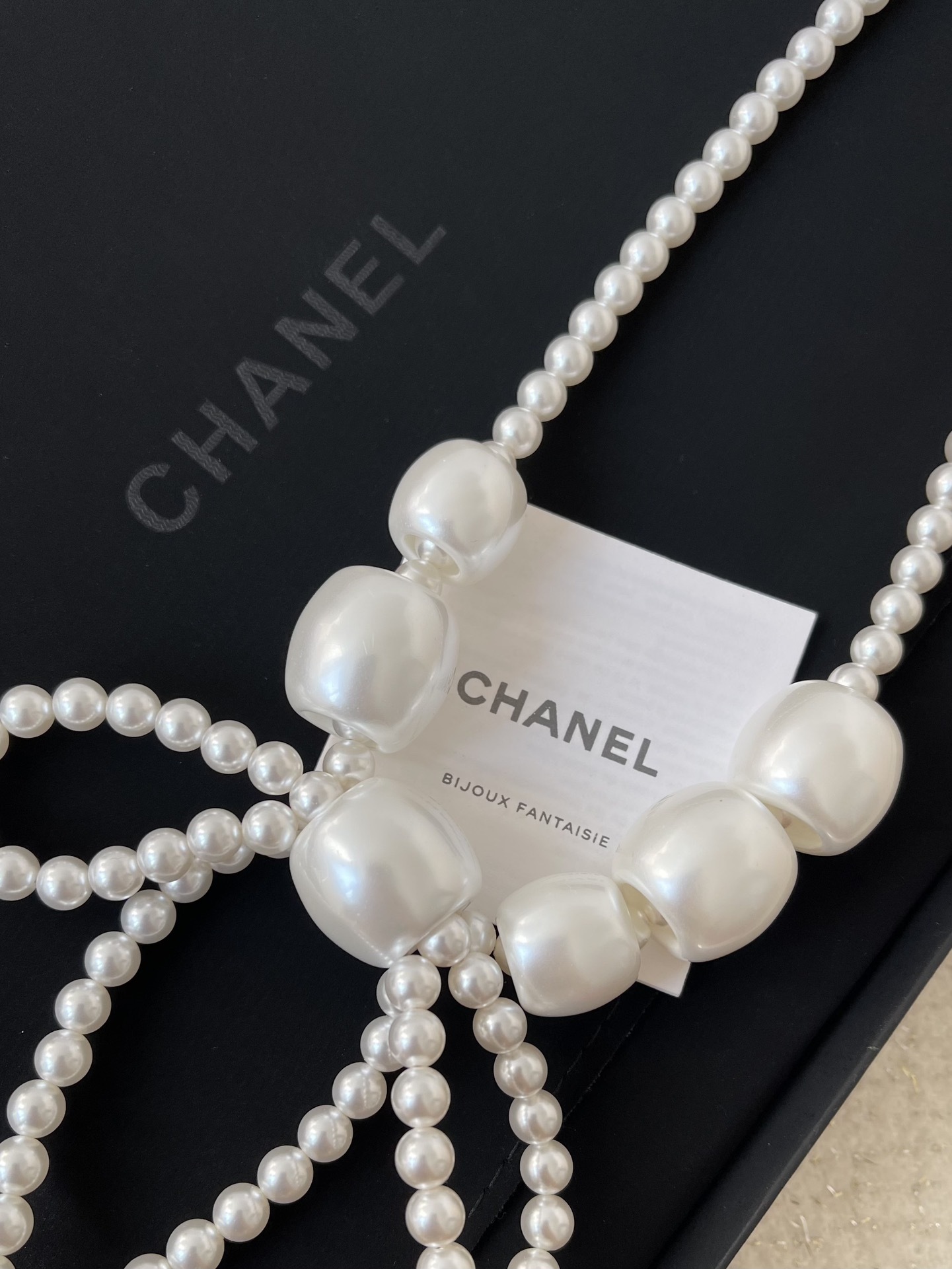 Chanel Elegant Pearl Bow Necklace with CC Logo Charms