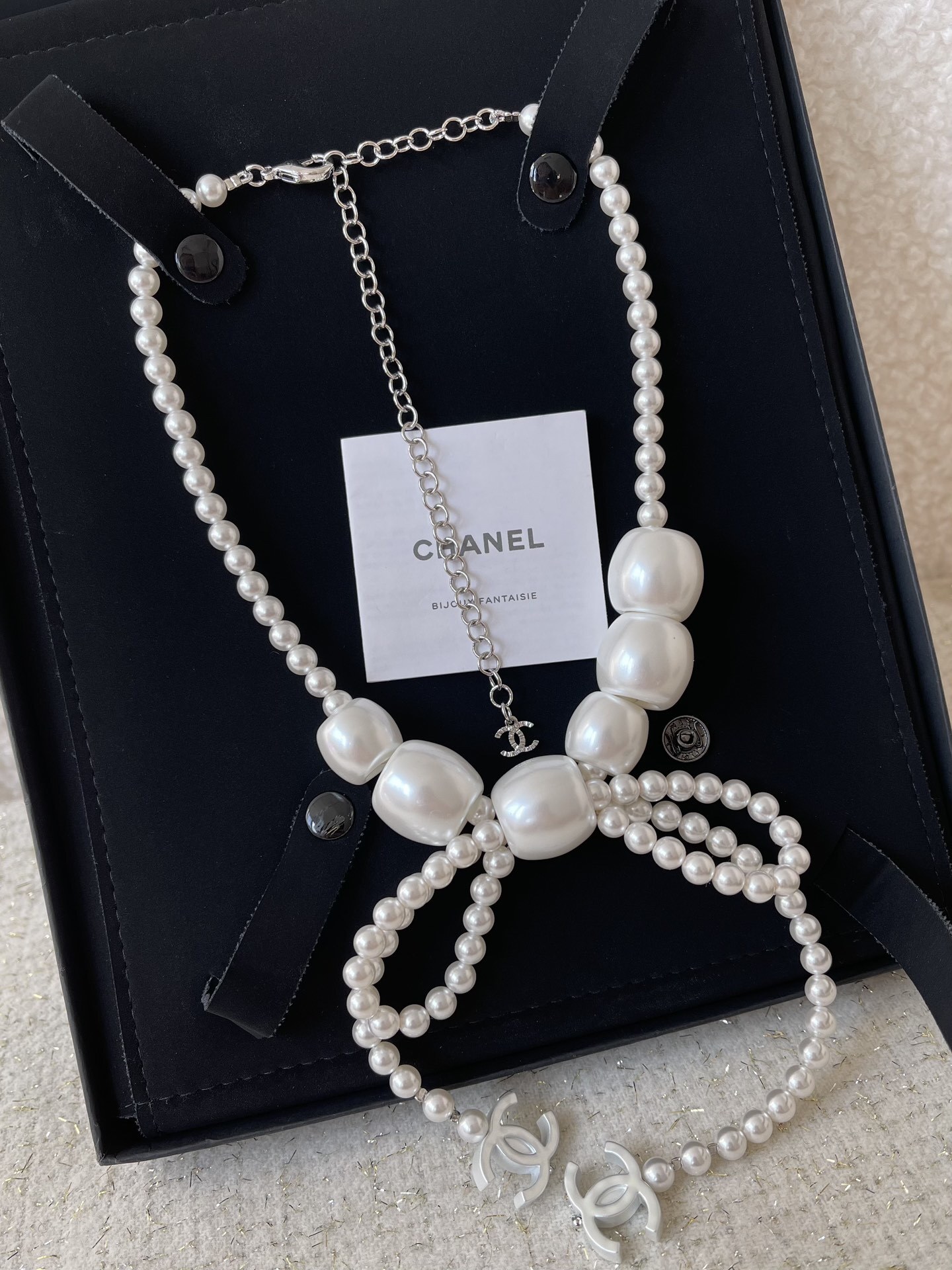 Chanel Elegant Pearl Bow Necklace with CC Logo Charms