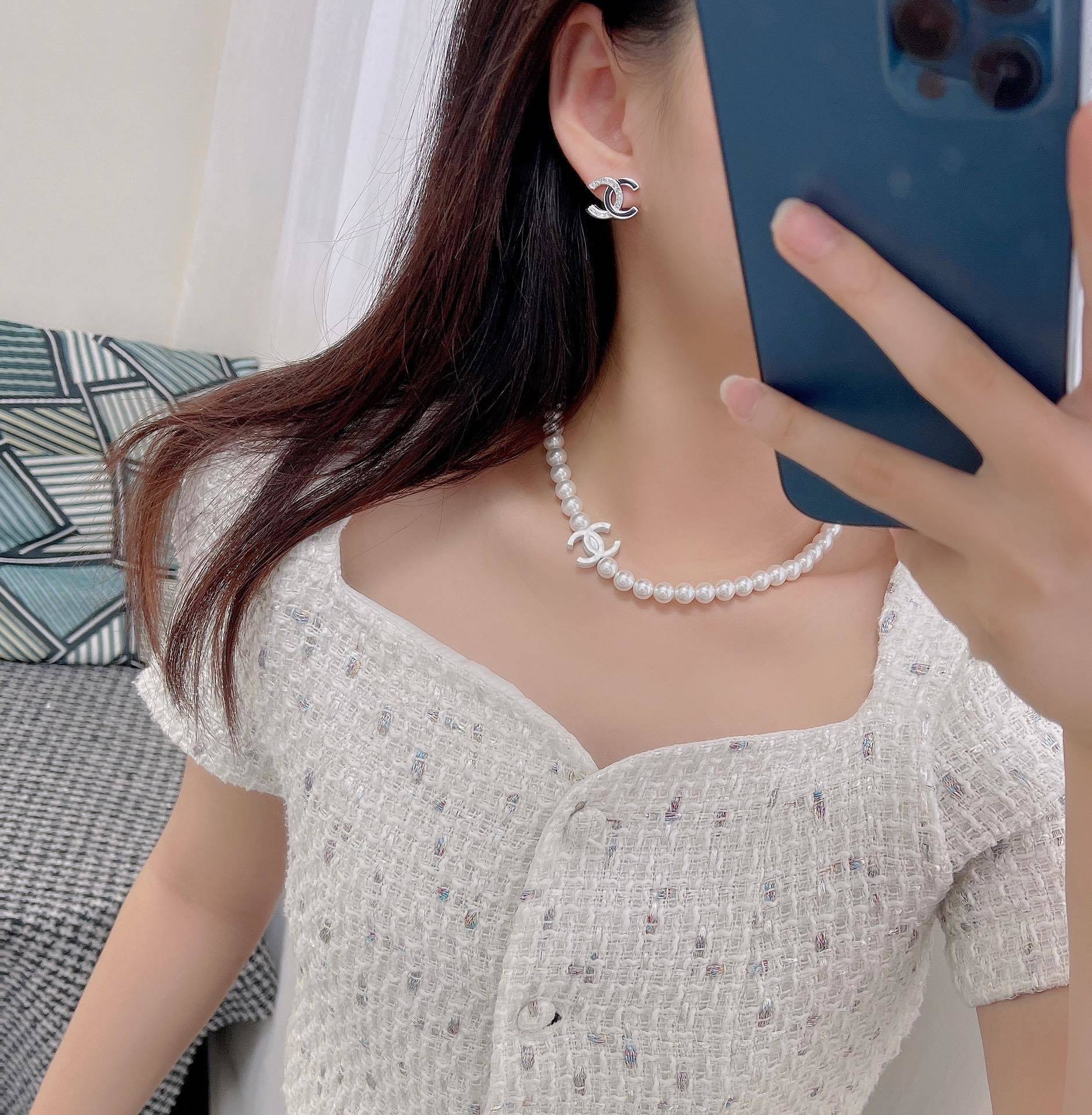 Elegant Pearl Necklace with Iconic CC Logo Charm